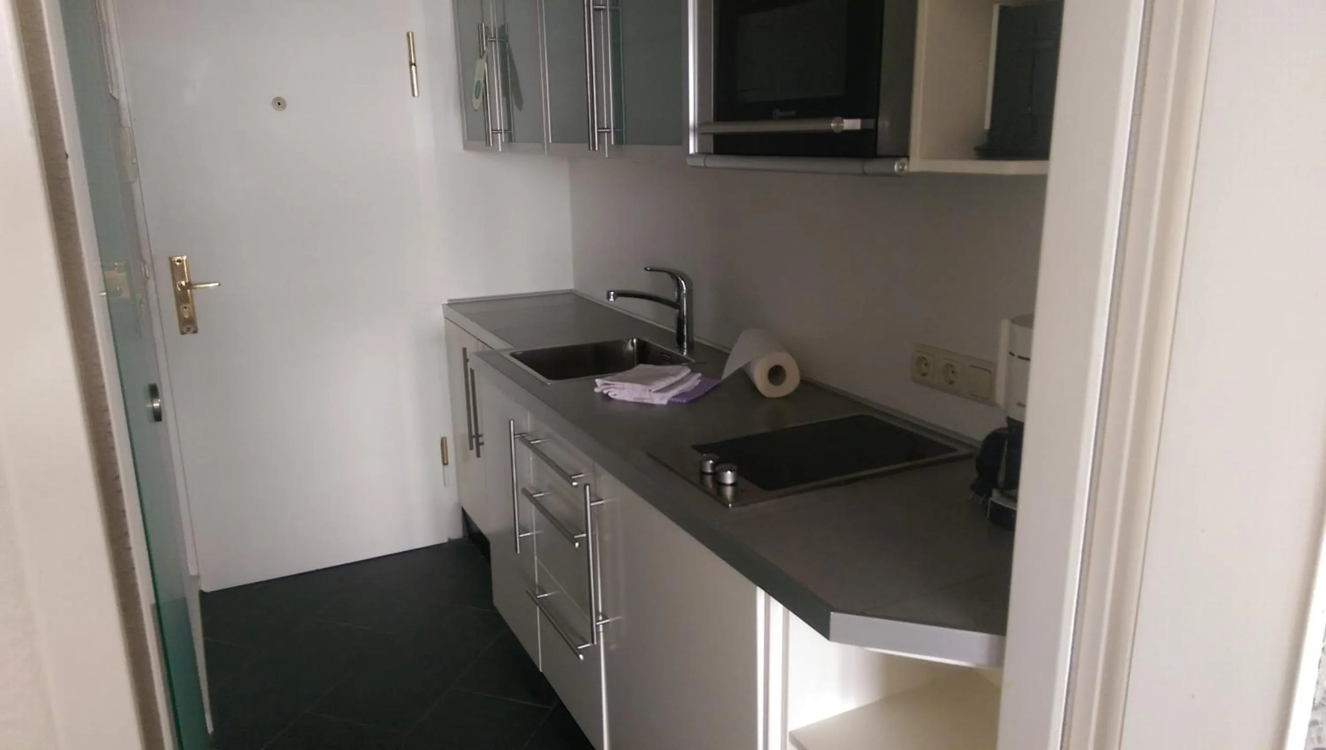 Kitchen or kitchenette in Top Appartements Roth am Strande