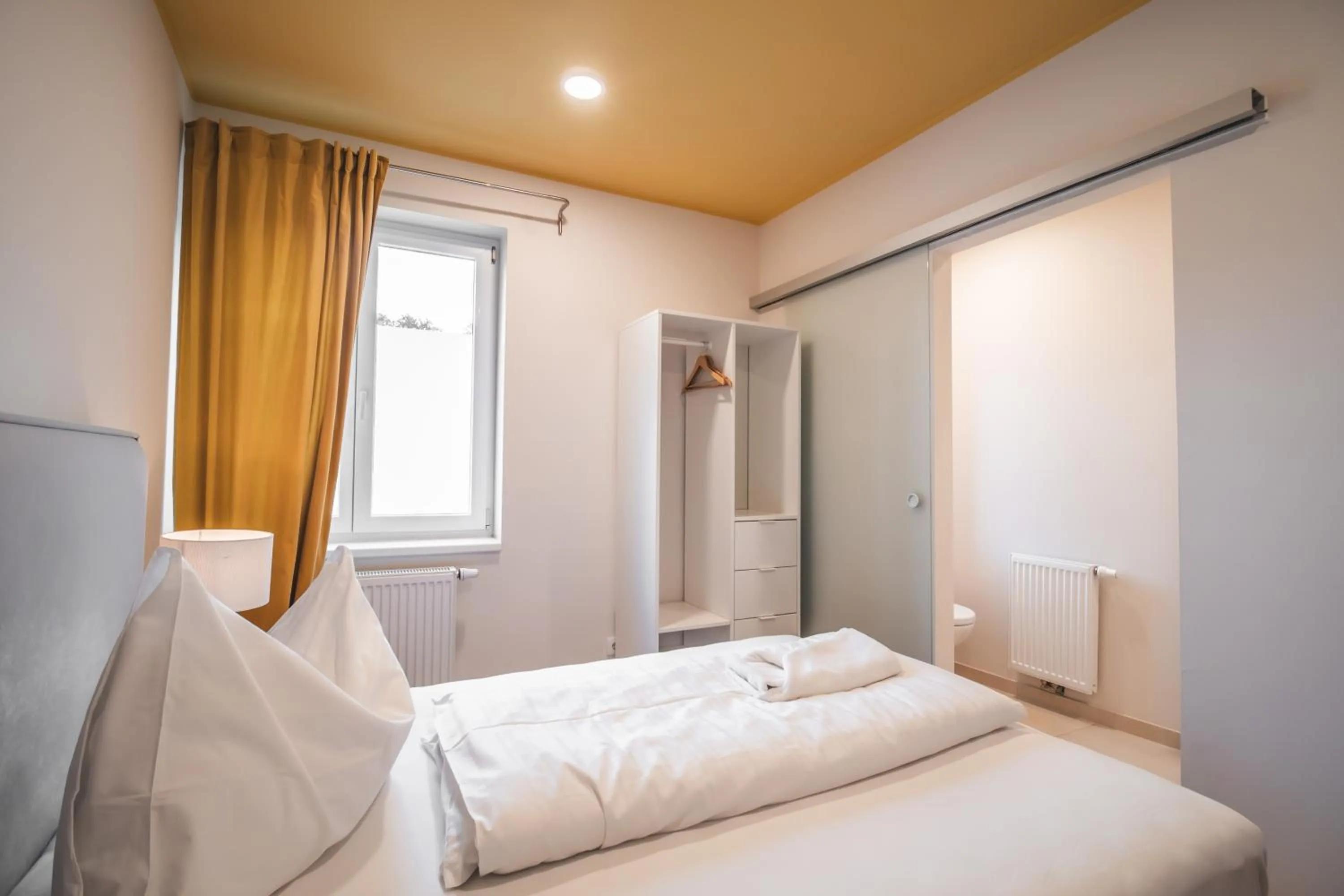 Bedroom, Bed in Boutiquehotel Caravella Velden by S4Y