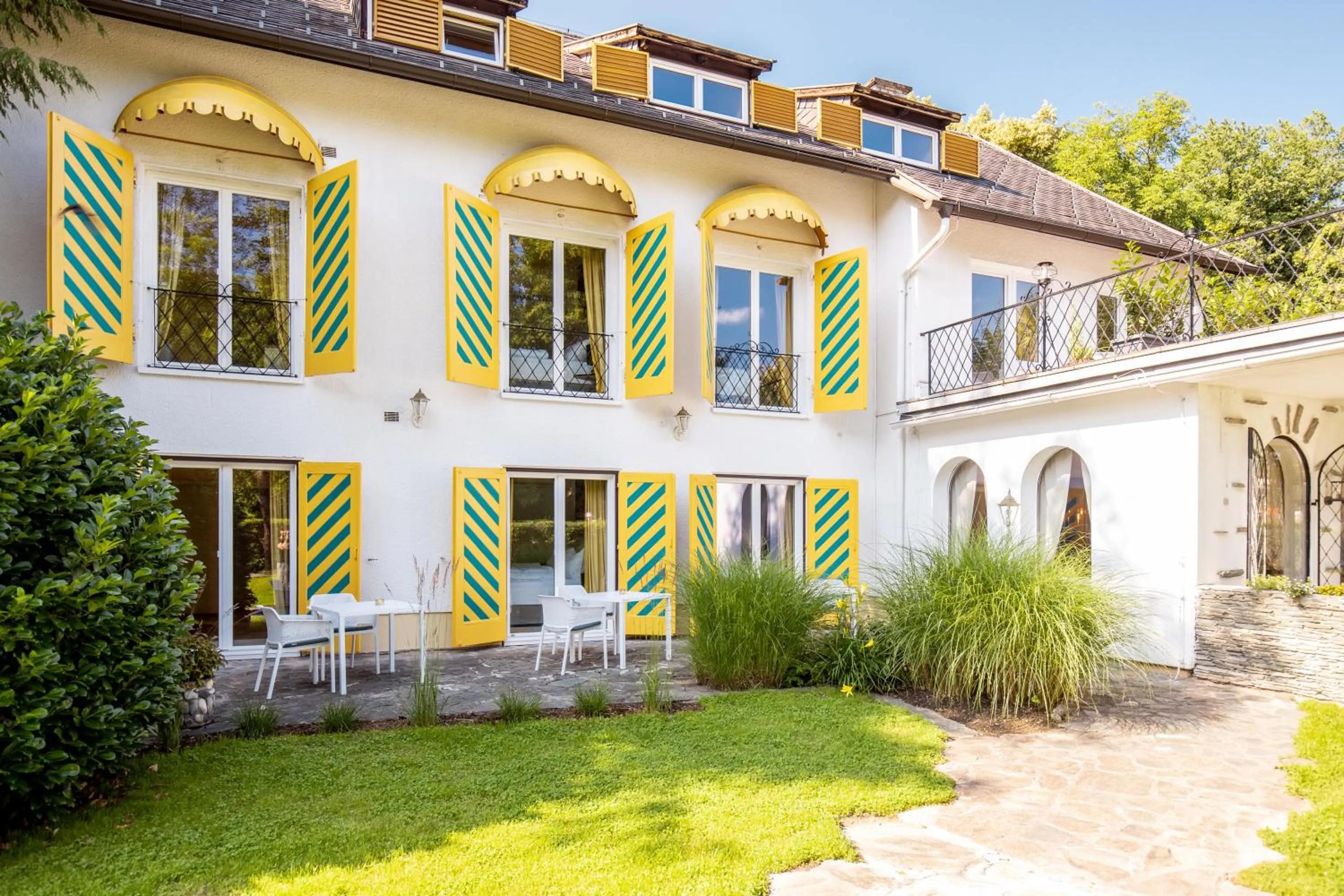 Property building in Boutiquehotel Caravella Velden by S4Y