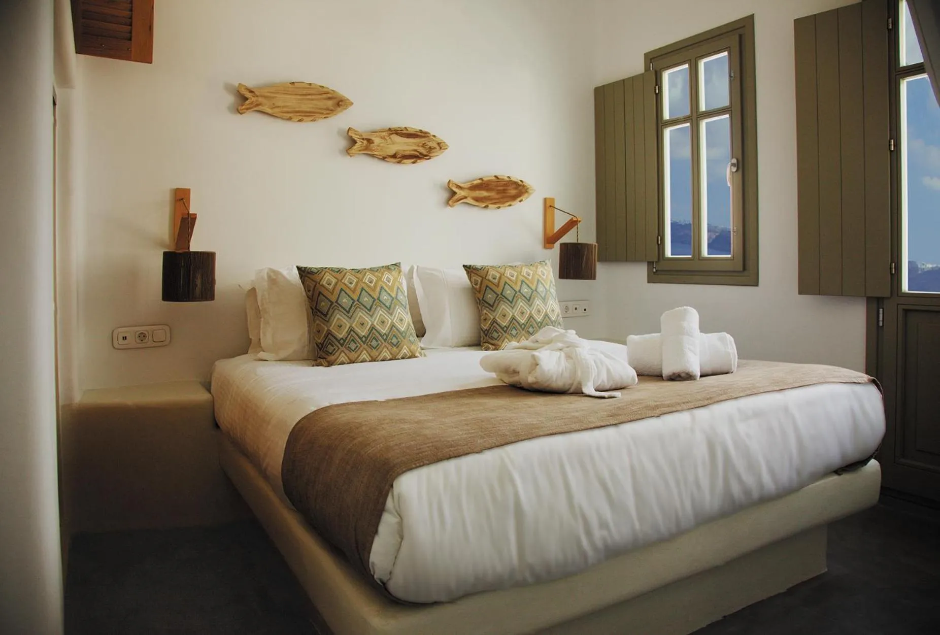 Bed in CAPE 9 Villas & Suites