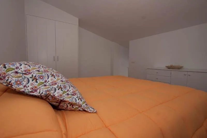 Bed in Aparthotel l'Heretat