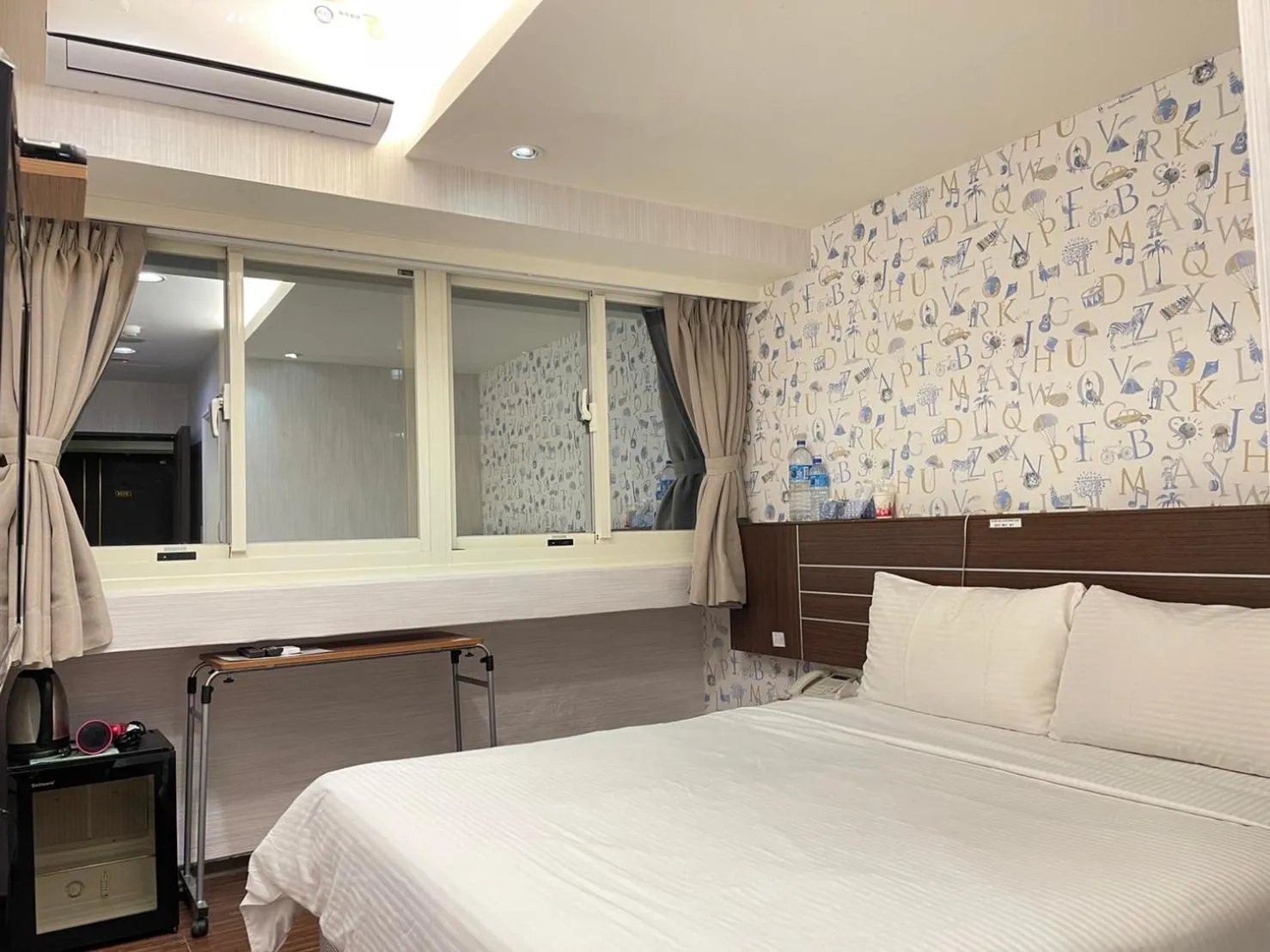 Bed in Jung Shin Hotel