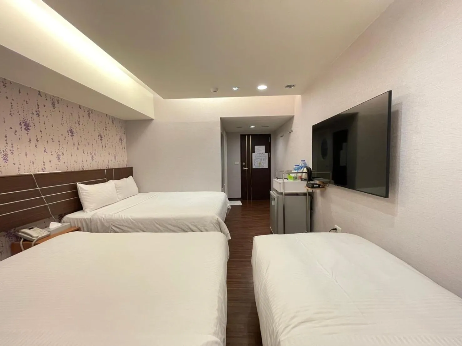Bed in Jung Shin Hotel