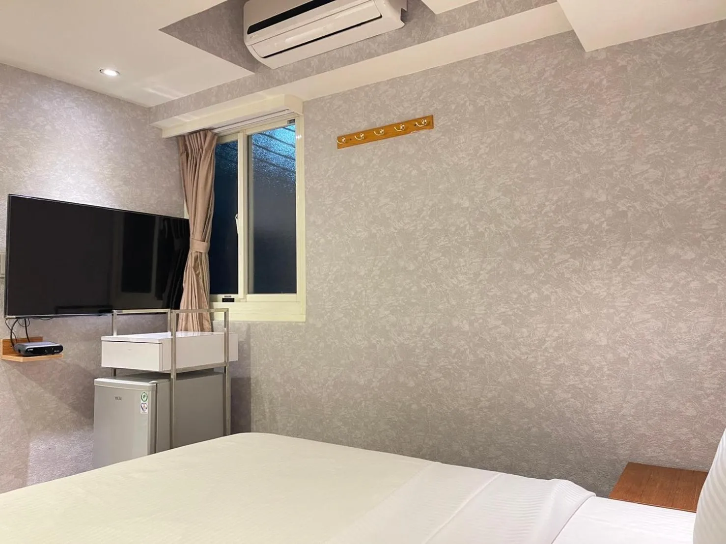 Bed in Jung Shin Hotel