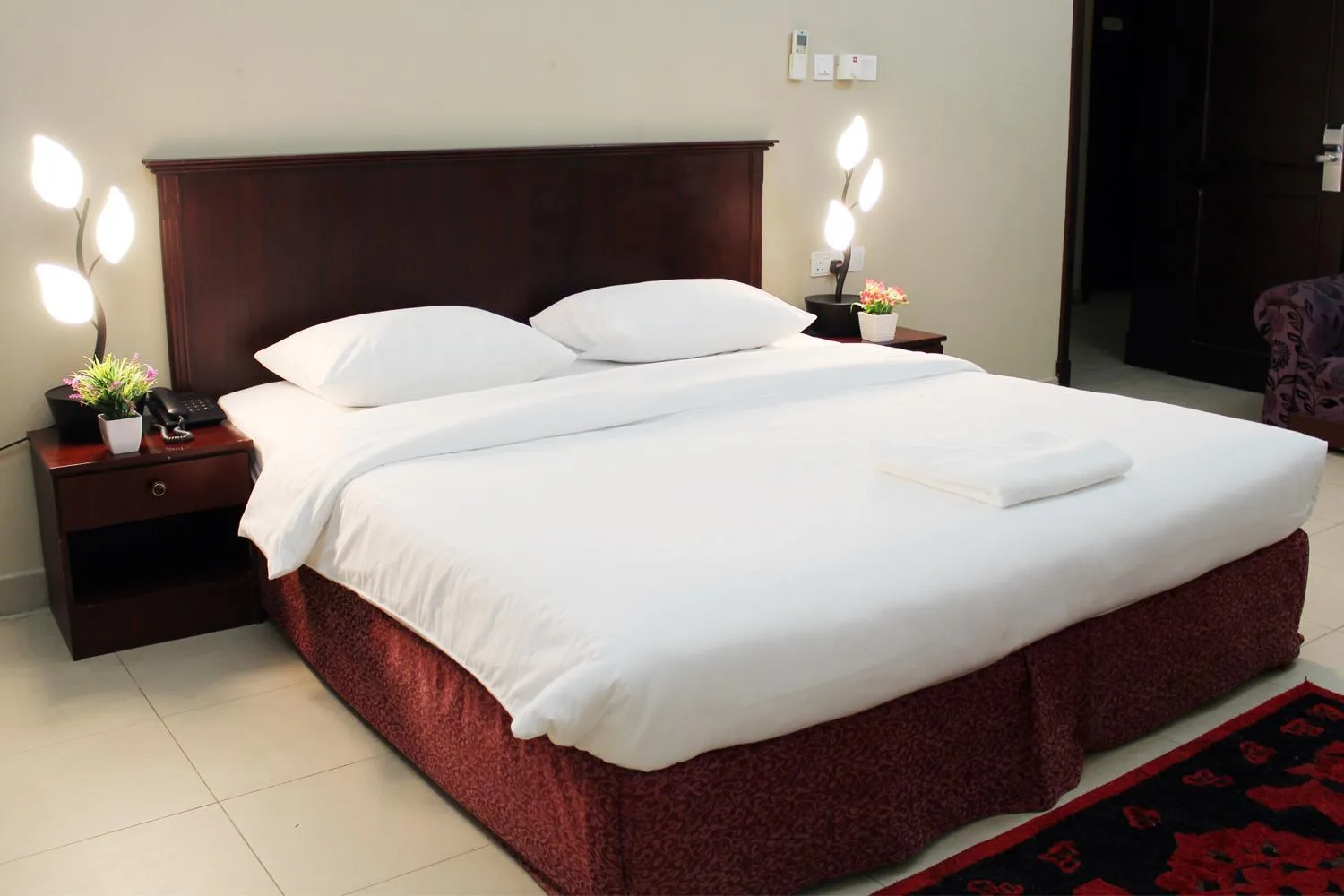 Bed in Sahara Hotel Apartments
