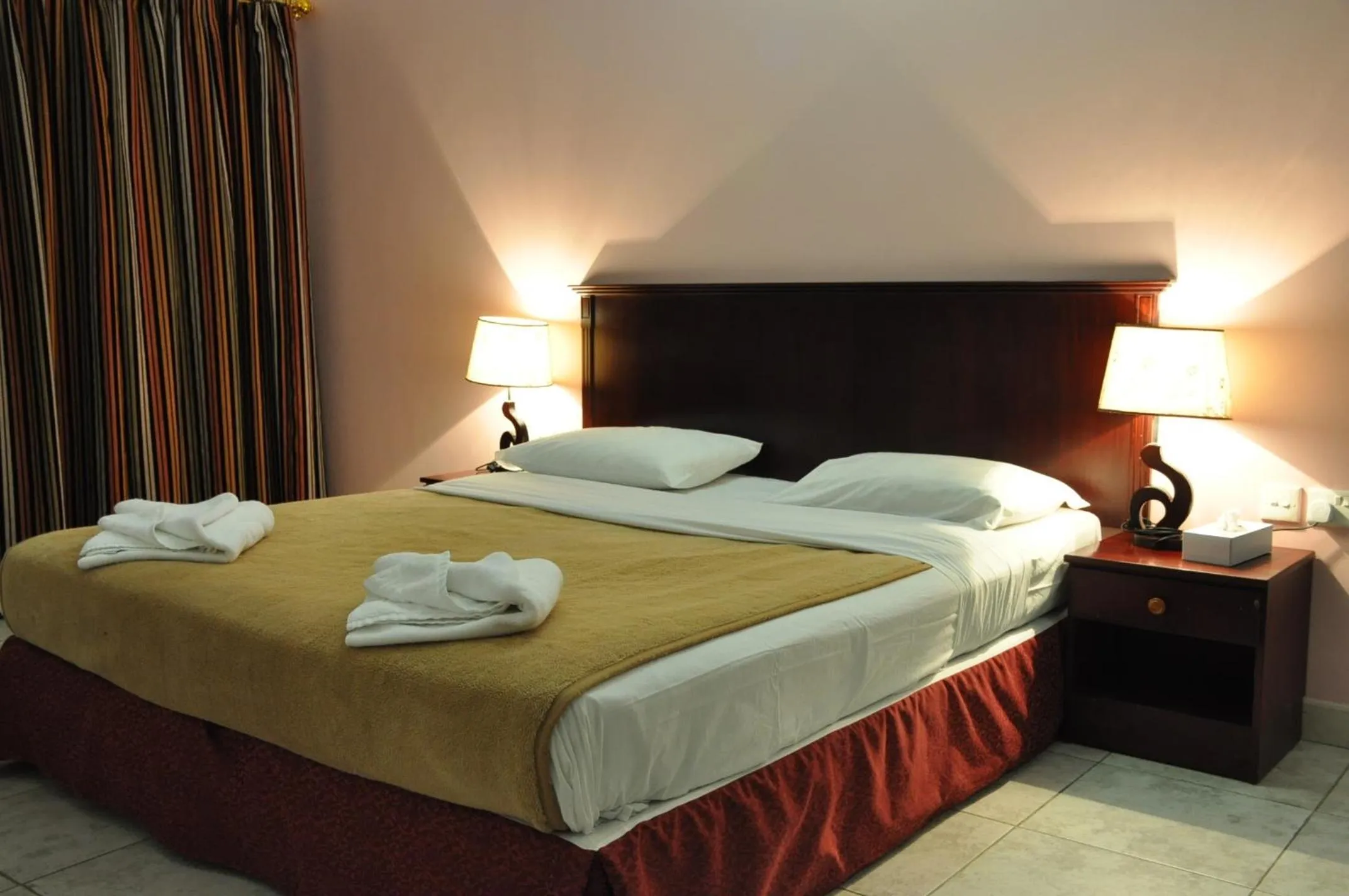 Photo of the whole room, Bed in Sahara Hotel Apartments