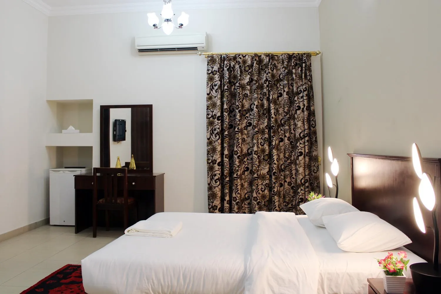 Bed in Sahara Hotel Apartments