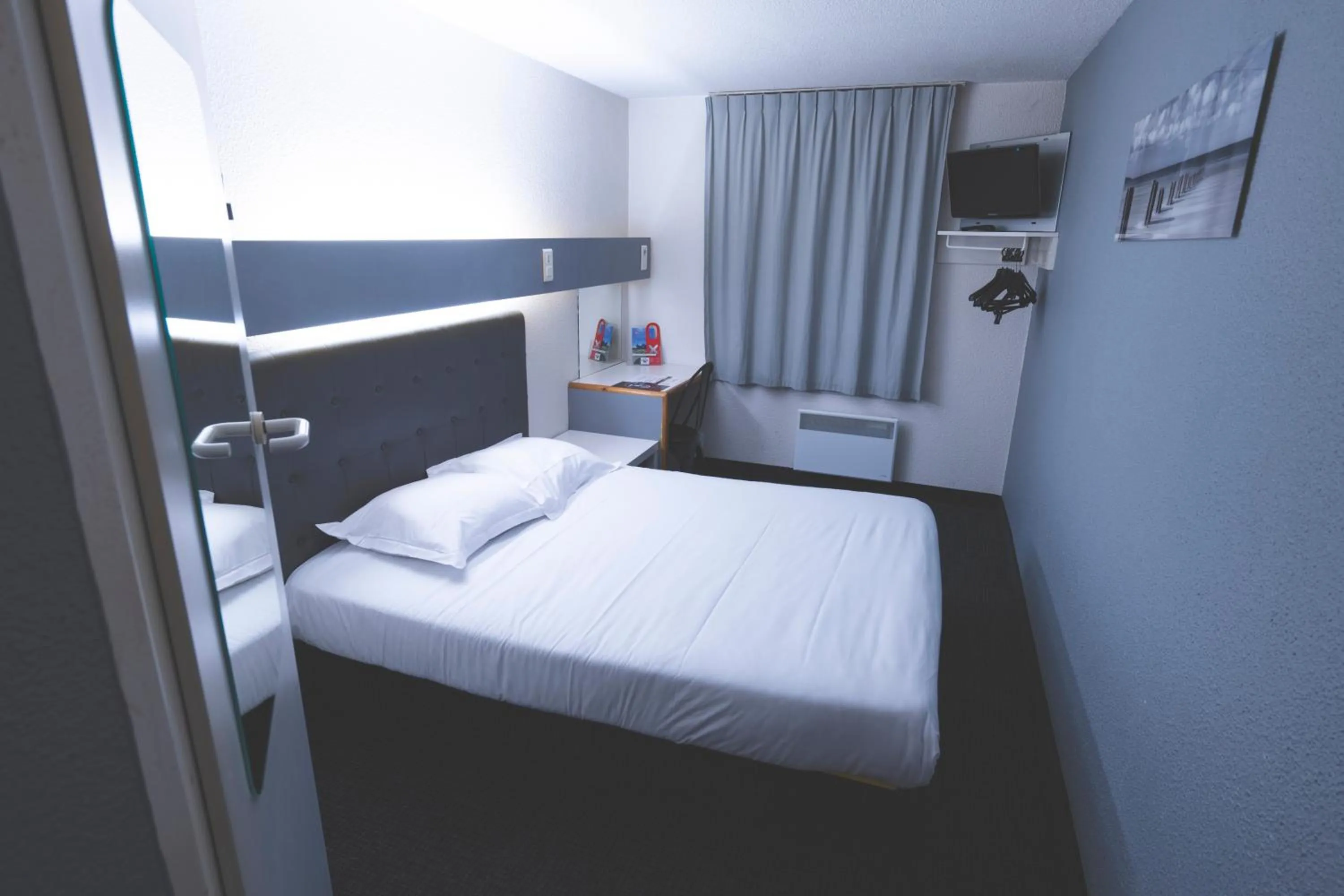 Bed in hôtel QUICK Palace Tours Nord