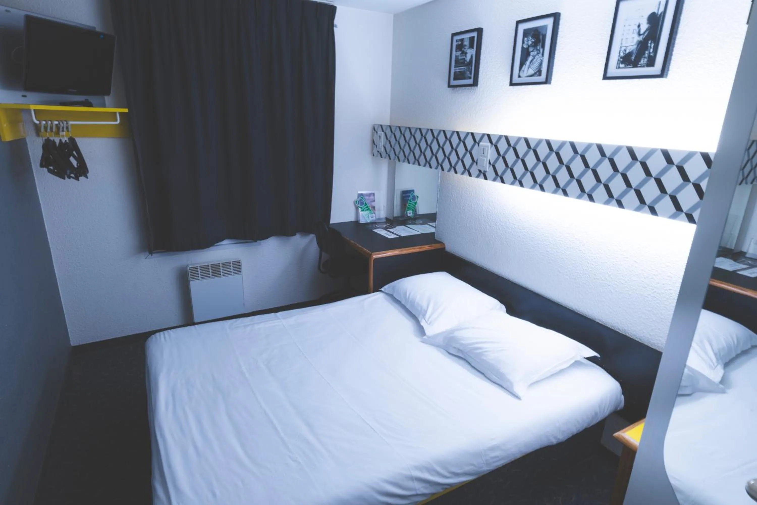 Bed in hôtel QUICK Palace Tours Nord