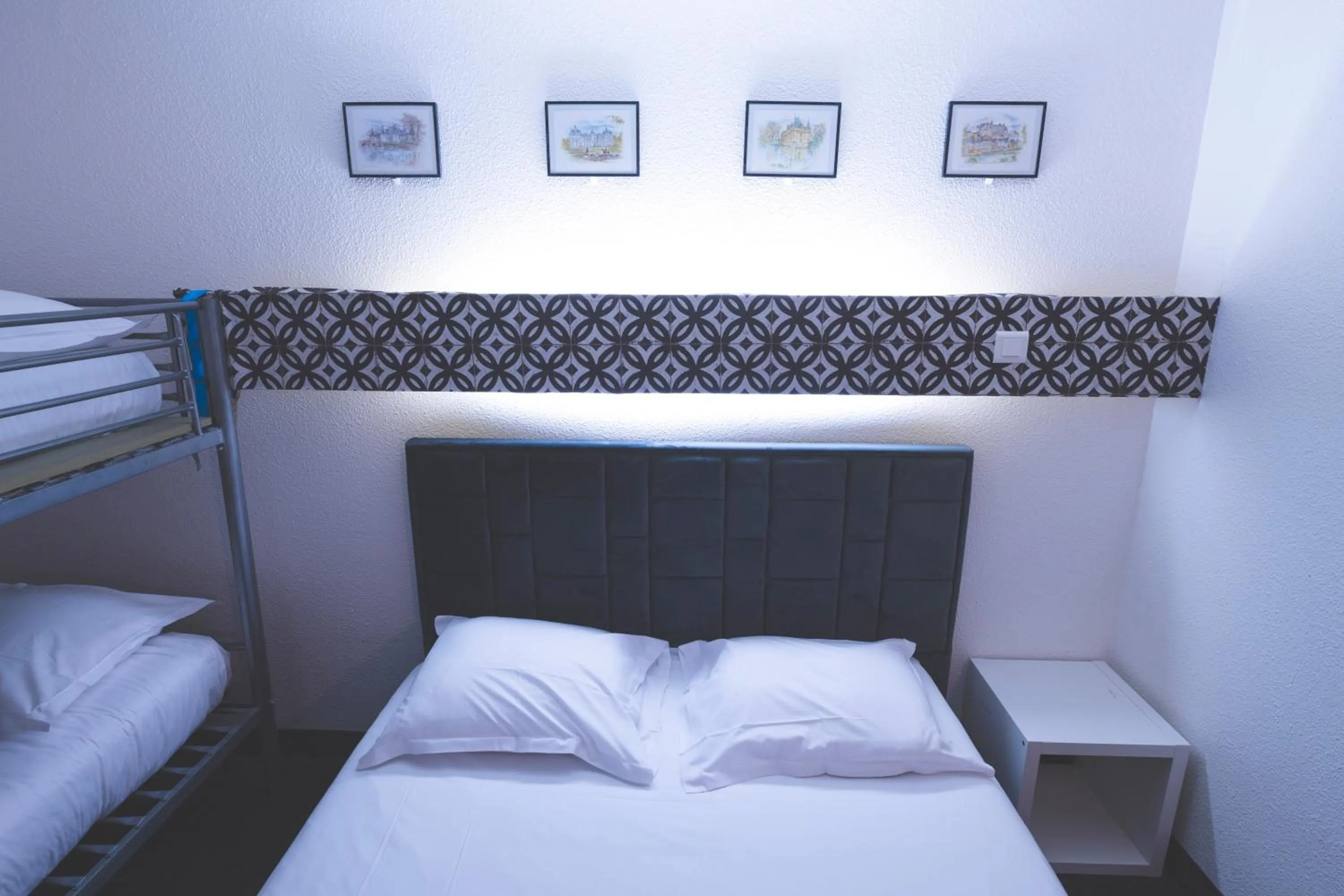 Bed in hôtel QUICK Palace Tours Nord