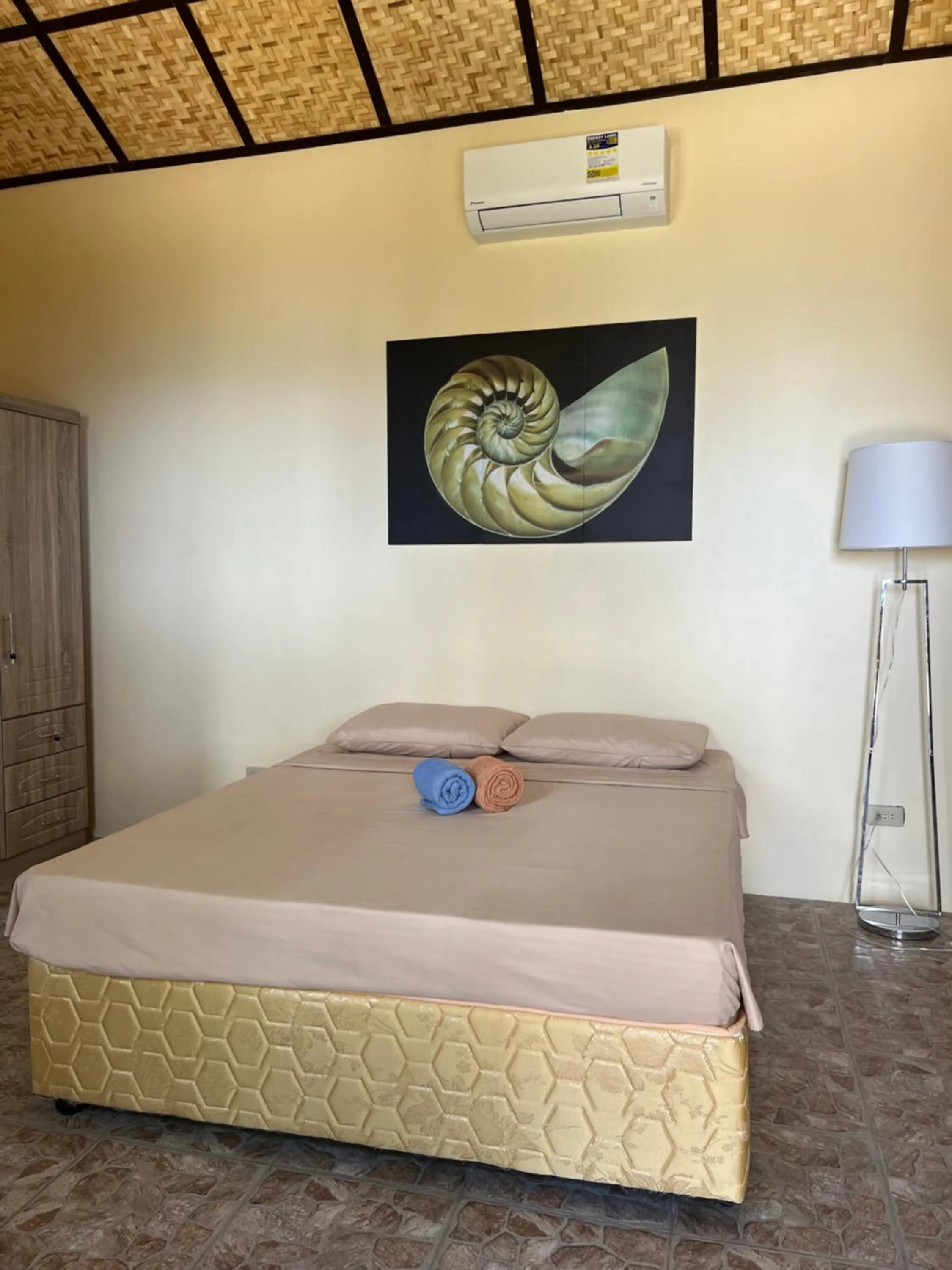 Bed in Bamboo Paradise Beach Resort