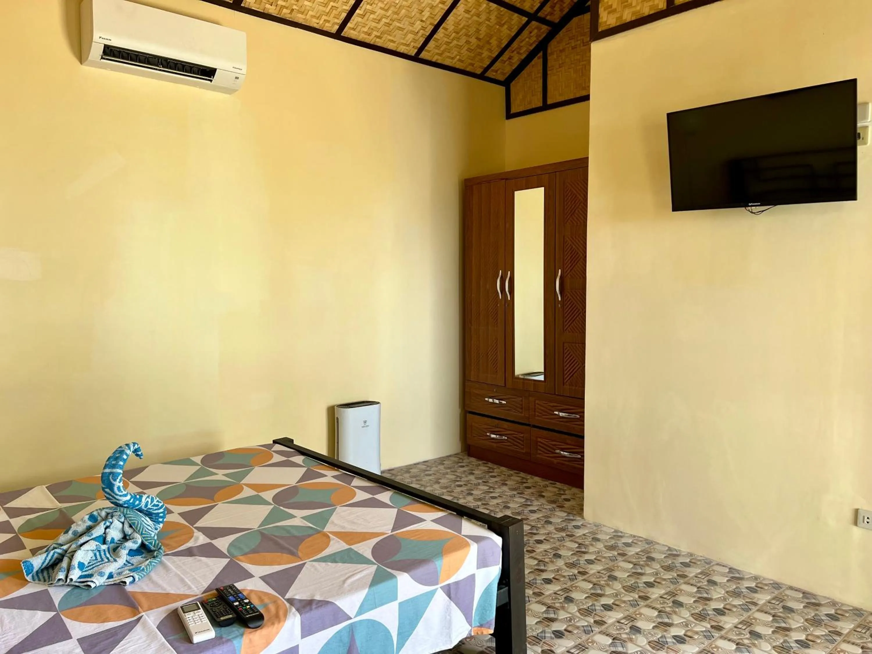 Bed in Bamboo Paradise Beach Resort