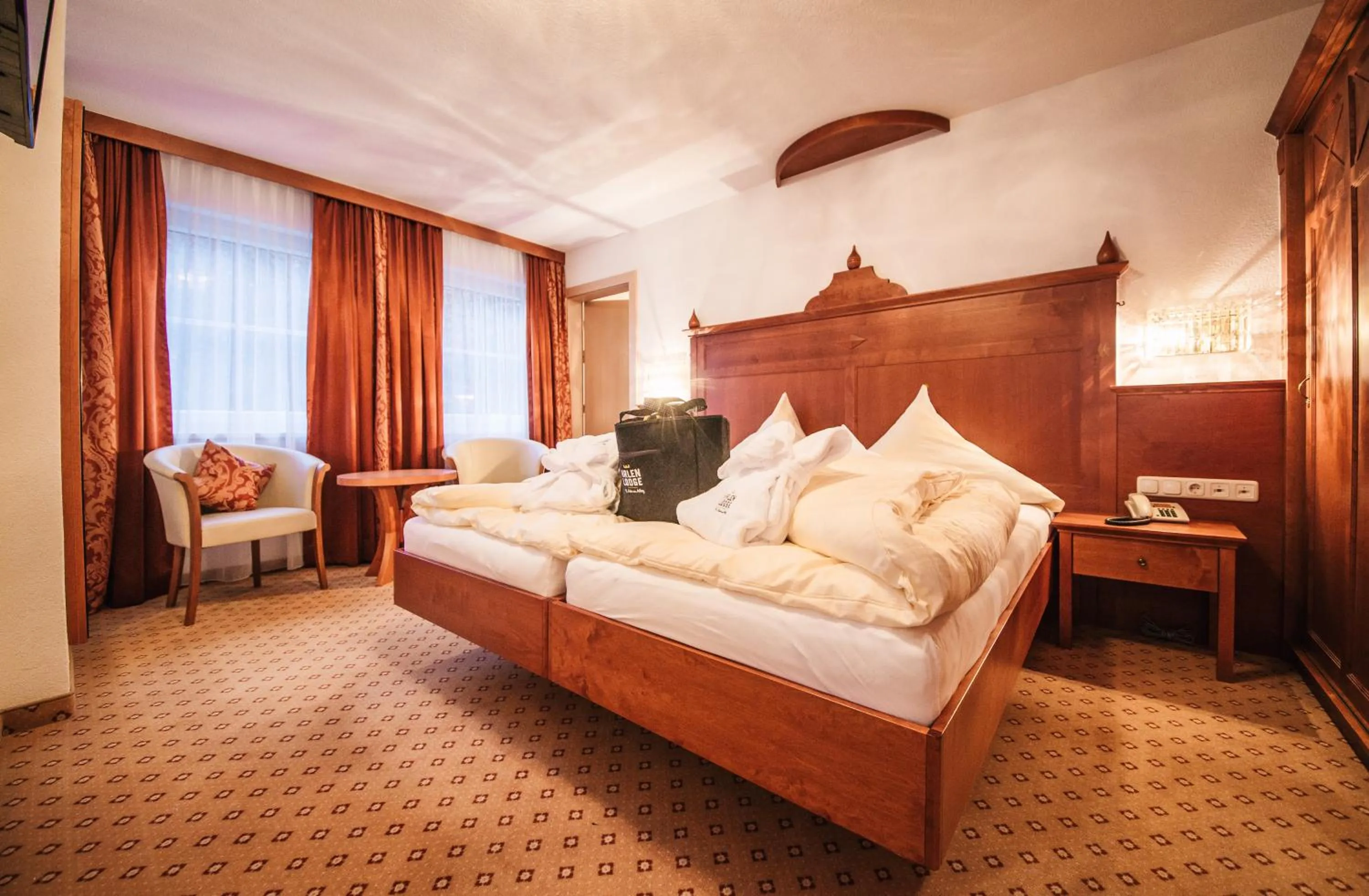Bedroom, Bed in Arlen Lodge Hotel-Garni