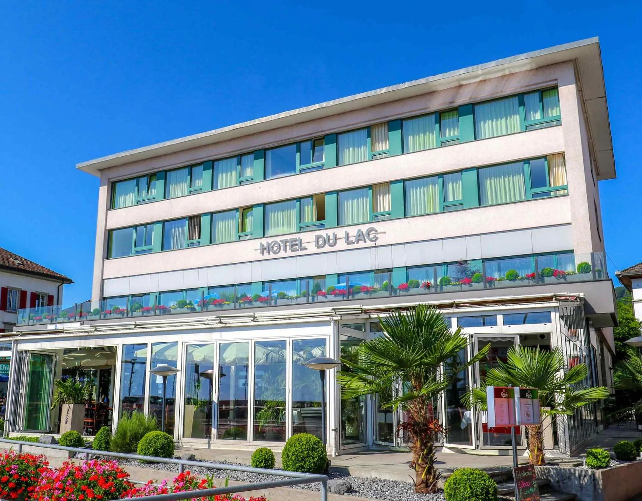 Property building in becozy du Lac Self-Check In Hotel Riviera Edition