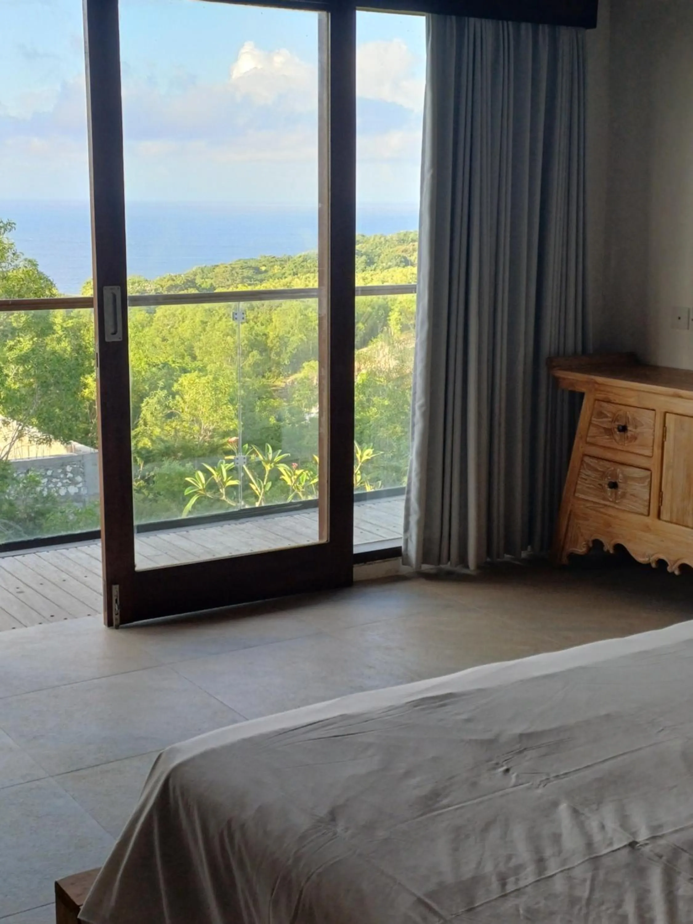 Bed in Green Bowl Beach Villas