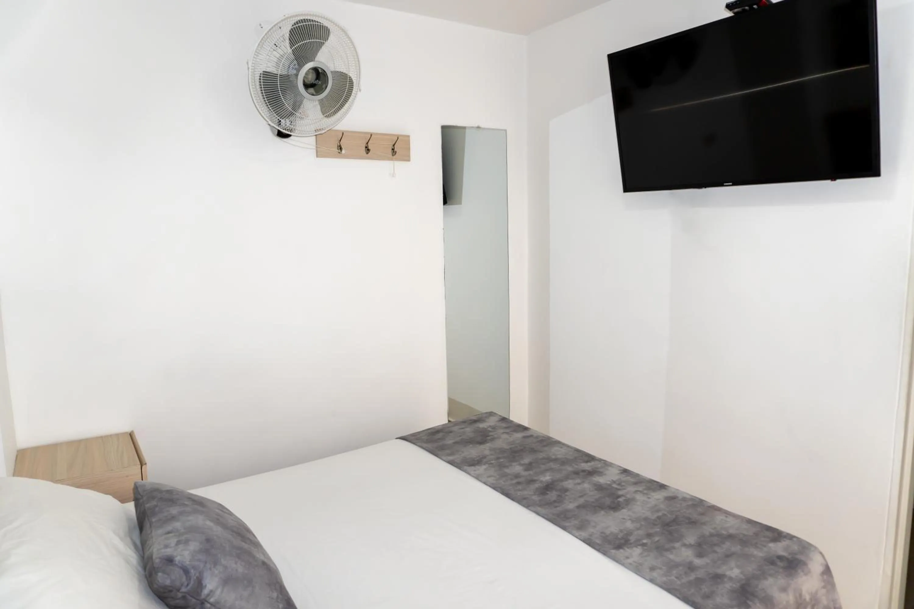 Bed in Hotel Alcaravan Medellín