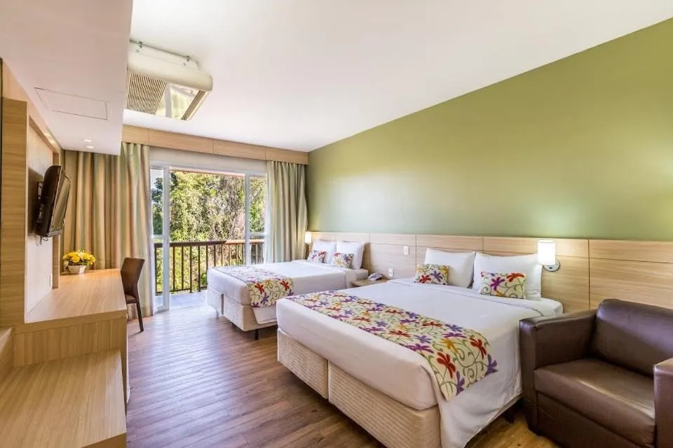 Bed in Tauá Hotel & Convention Caeté