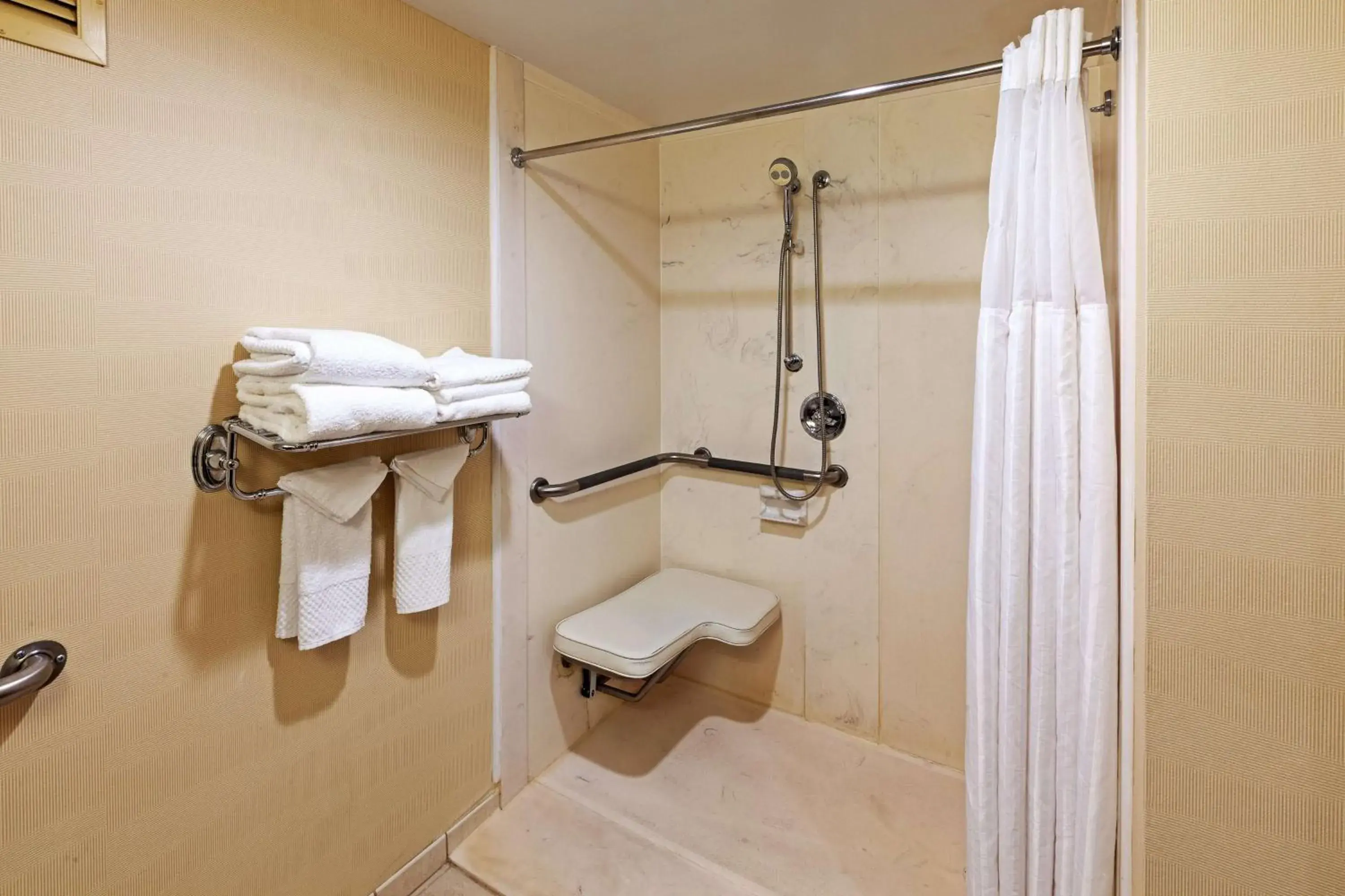 One-Bedroom King Suite with Roll-In Shower - Mobility Access/Non-Smoking in Embassy Suites by Hilton Greensboro Airport One-Bedroom King Suite with Roll-In Shower - Mobility Access/Non-Smoking in Embassy Suites by Hilton Greensboro Airport