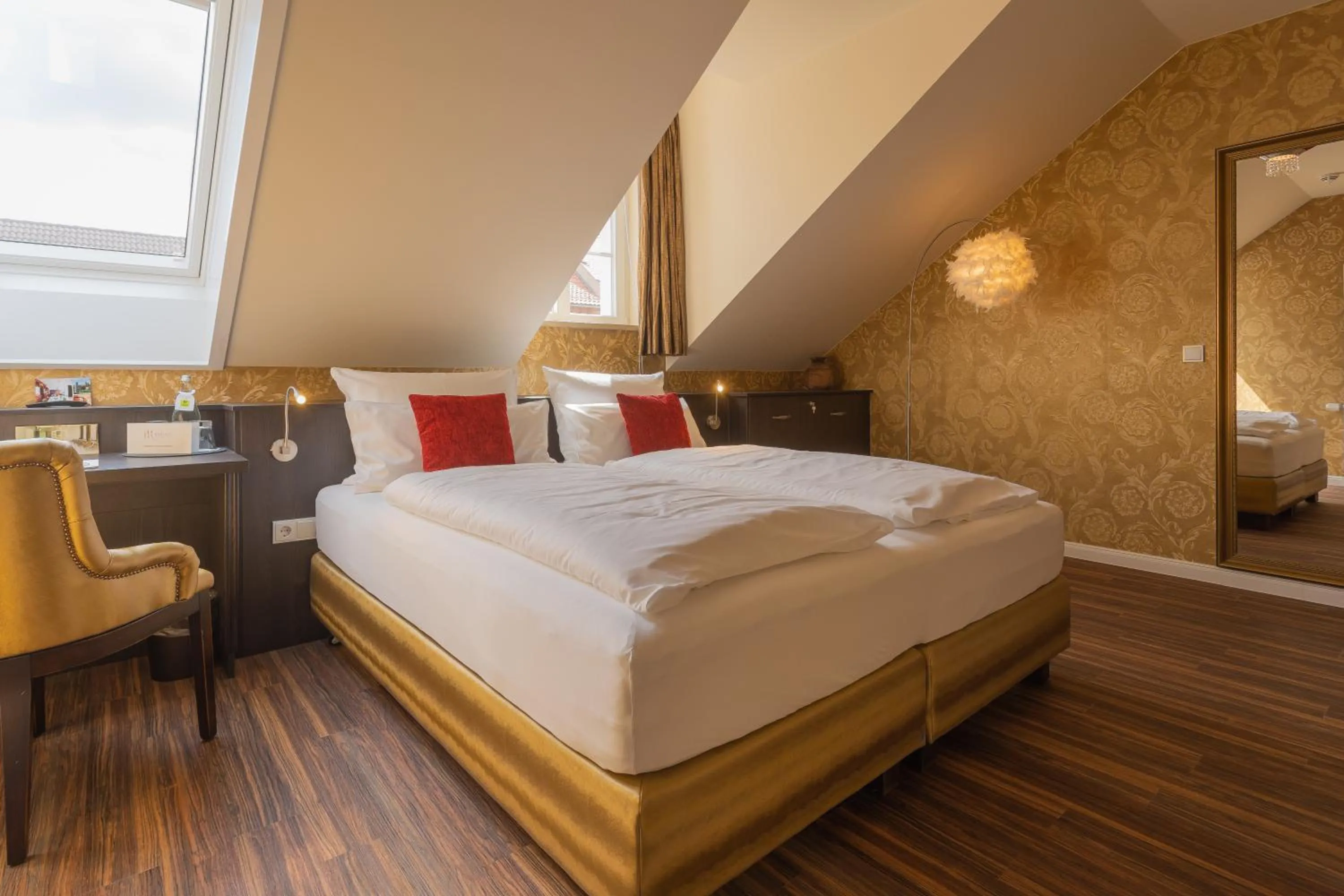 Bed in MOMENTS Boutique Hotel