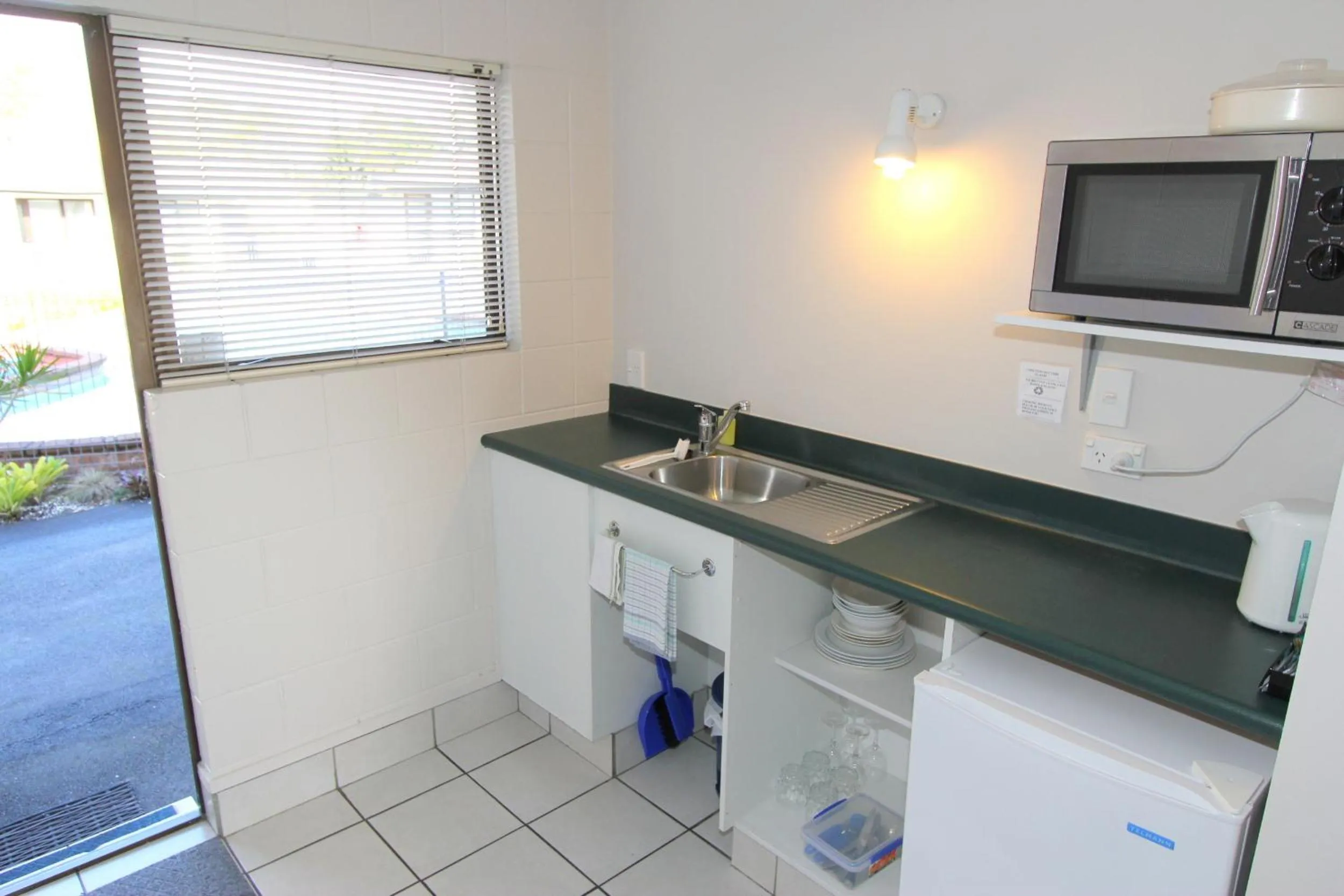 Kitchen or kitchenette in Walton Park Motor Lodge