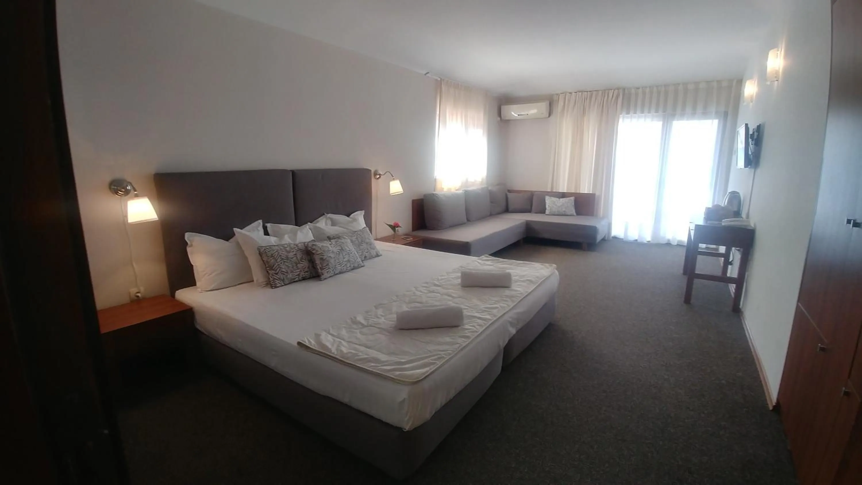 Seating area, Bed in Family Hotel Muses