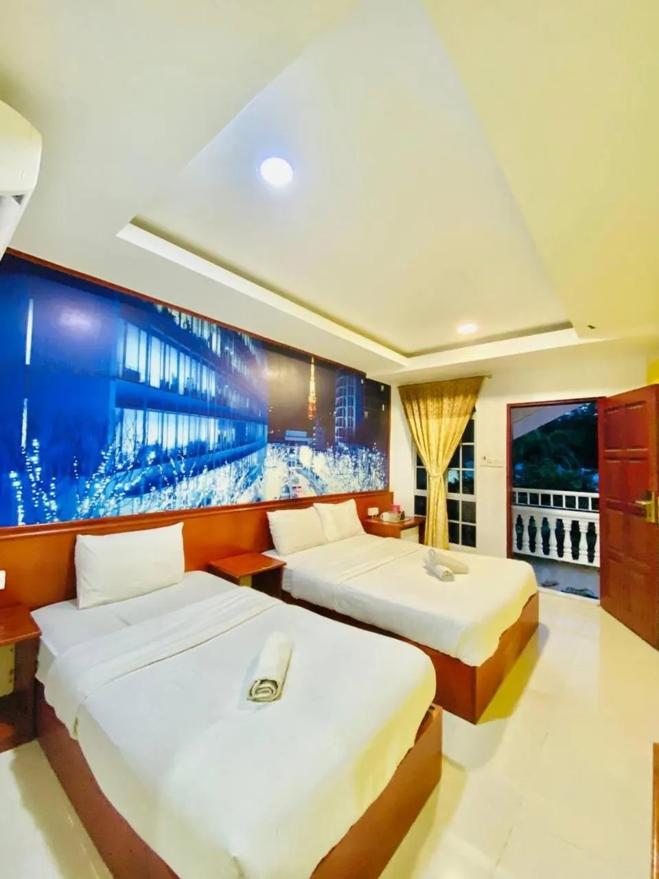 Bed in Landcons Hotel & Resort