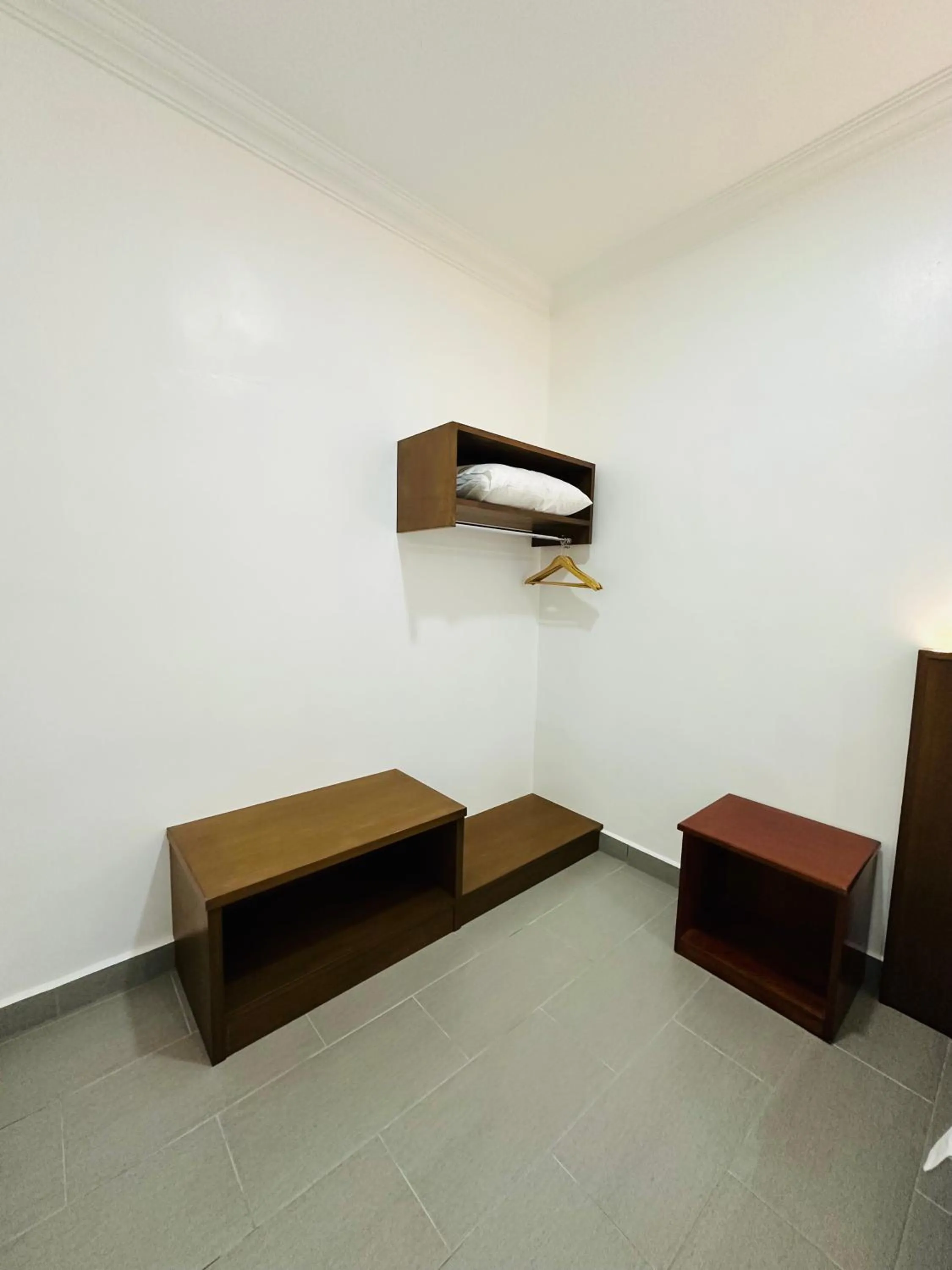 wardrobe in Landcons Hotel & Resort