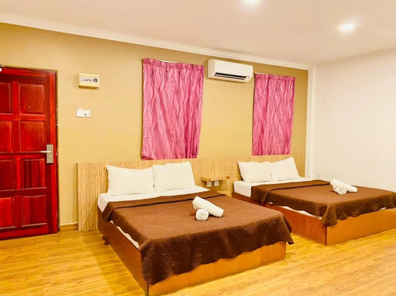 Bed in Landcons Hotel & Resort