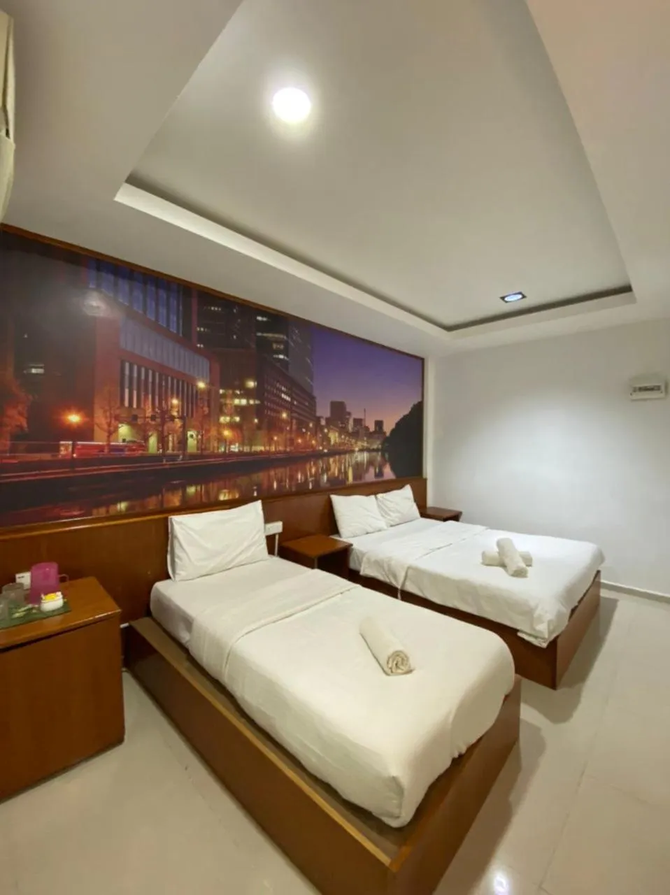 Bed in Landcons Hotel & Resort
