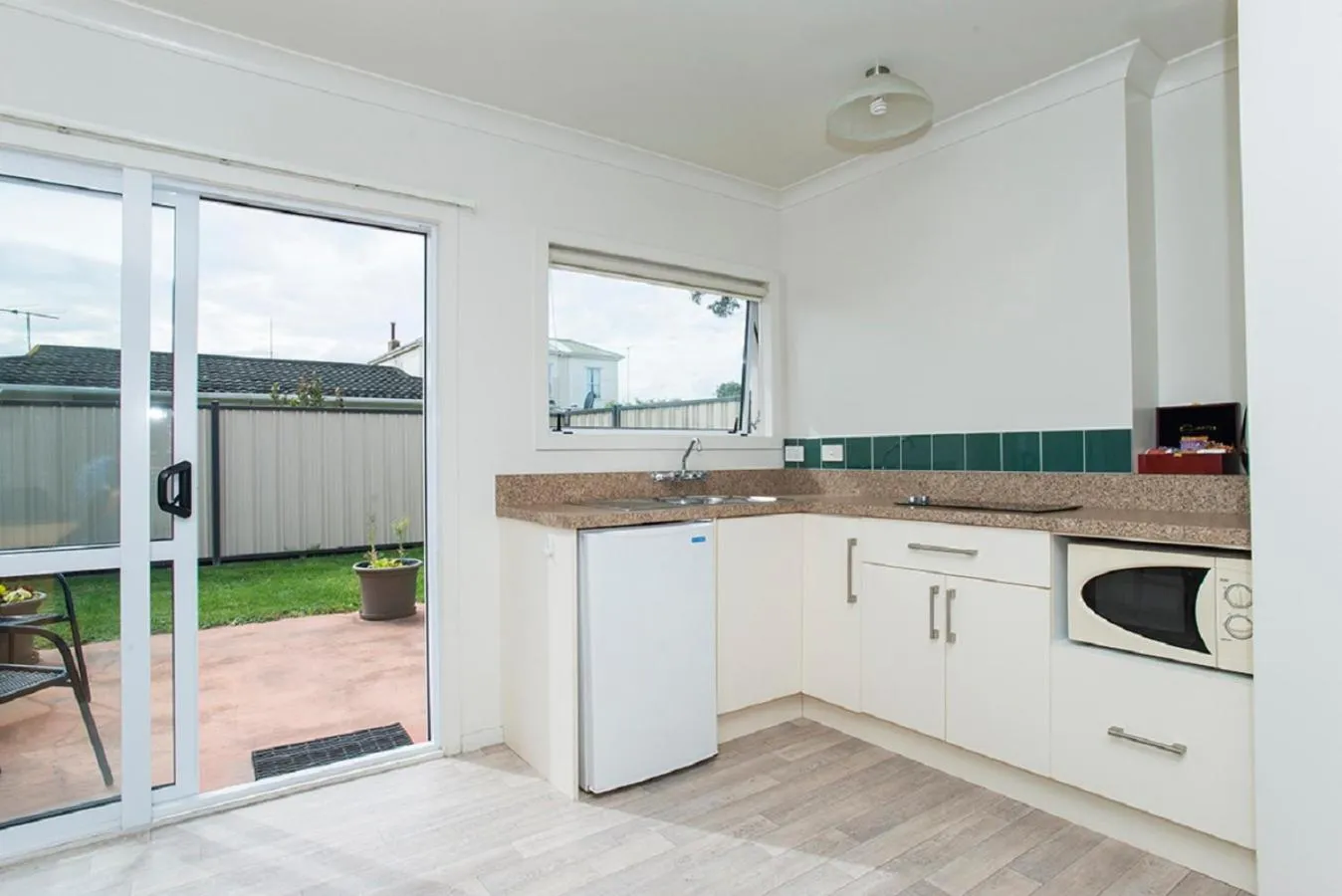 Kitchen or kitchenette in AhiKaa Gisborne Motel