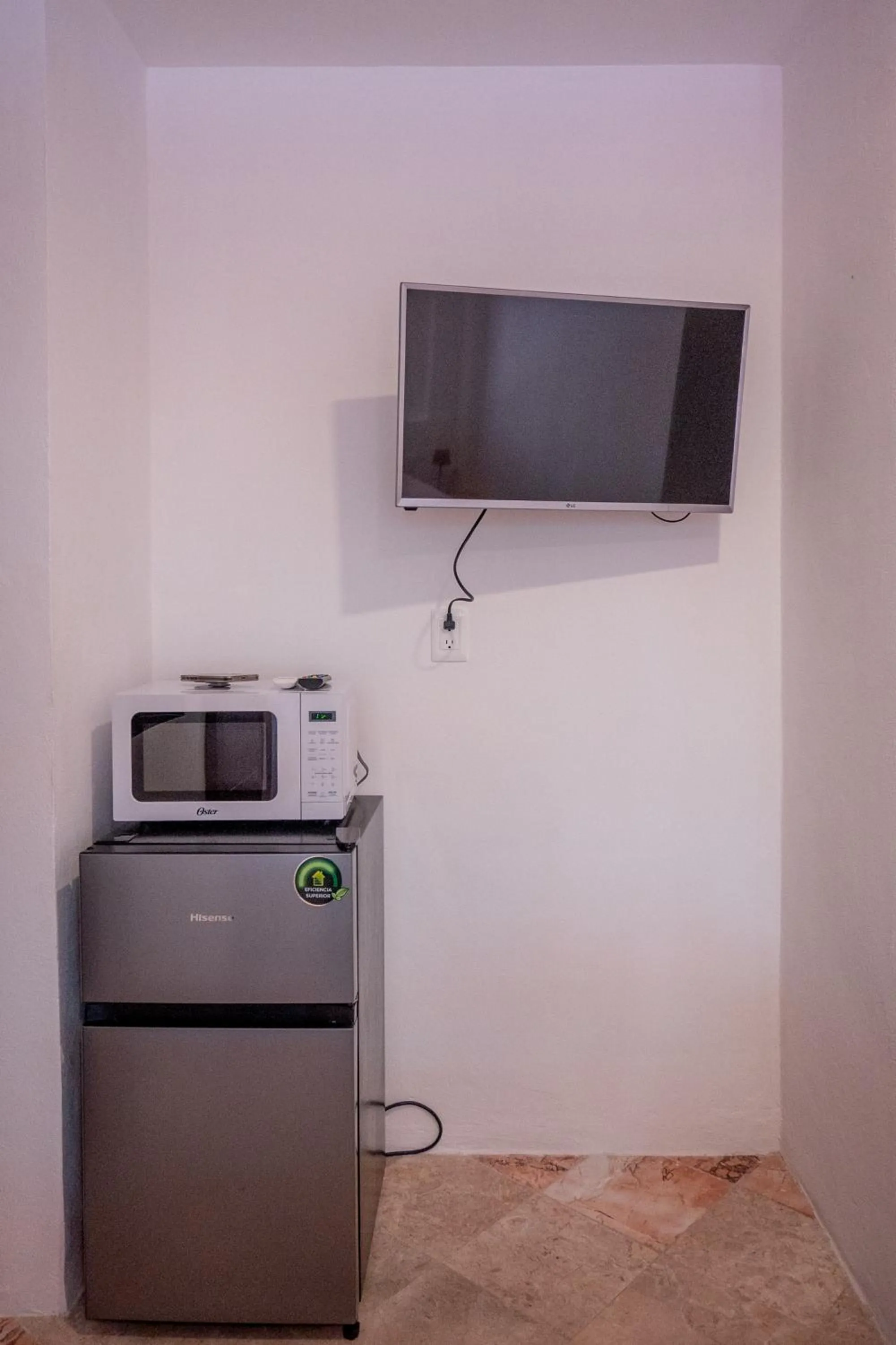 TV and multimedia in Cancún Suites Apartments - Hotel Zone