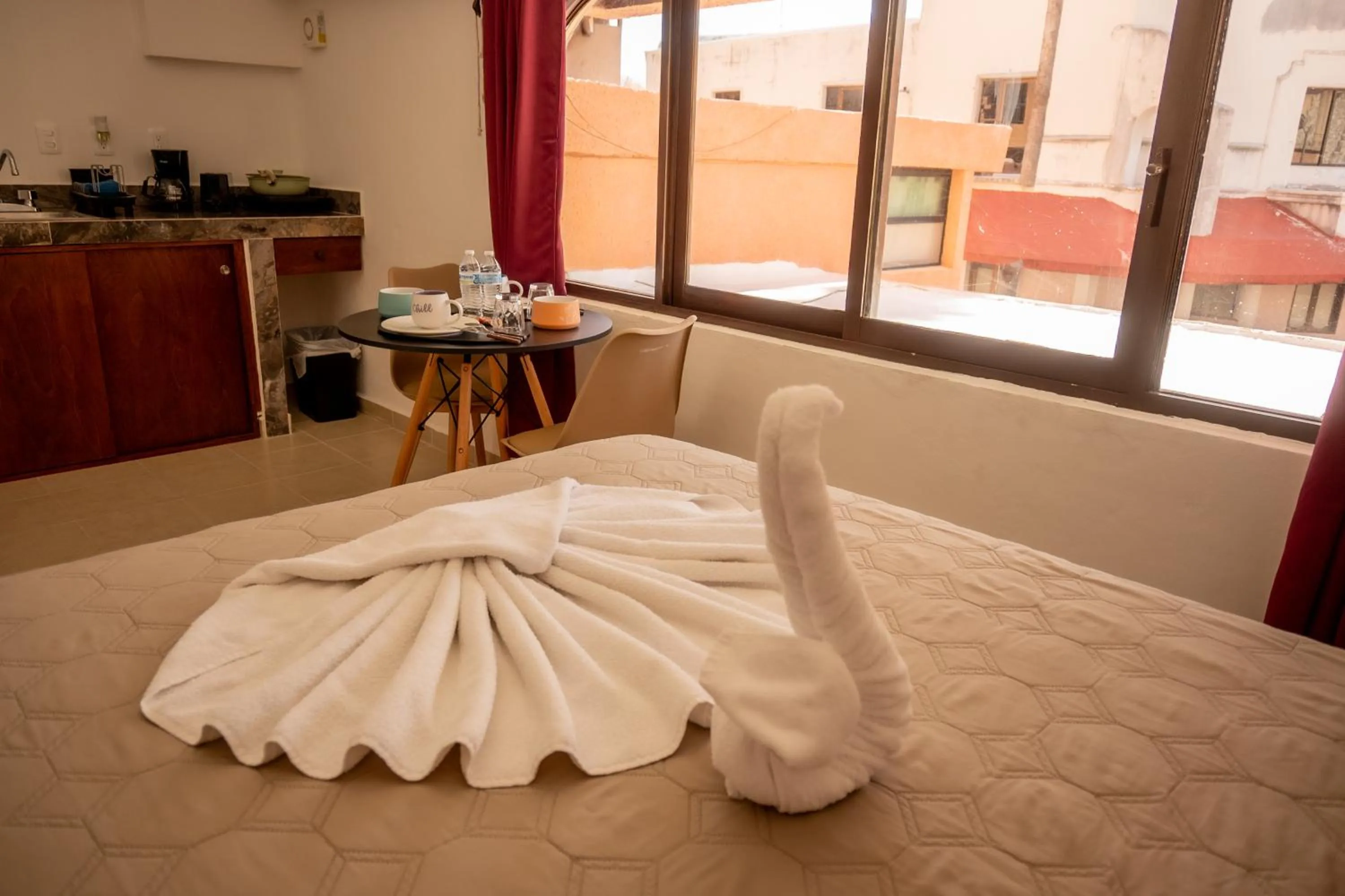 Photo of the whole room, Bed in Cancún Suites Apartments - Hotel Zone