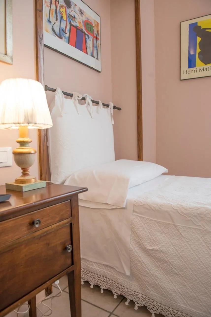 Bed in Affittacamere Benedetta