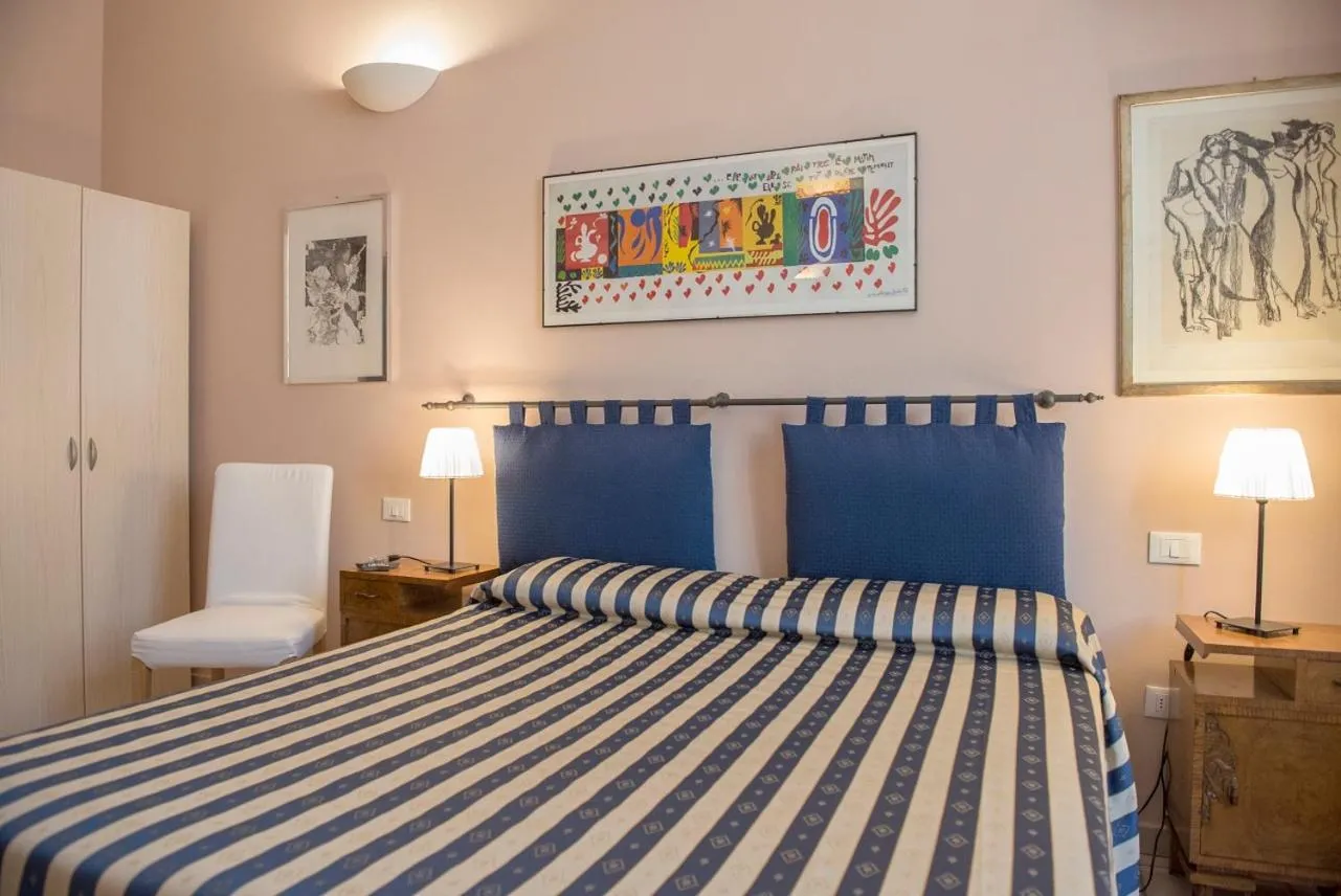 Bed in Affittacamere Benedetta