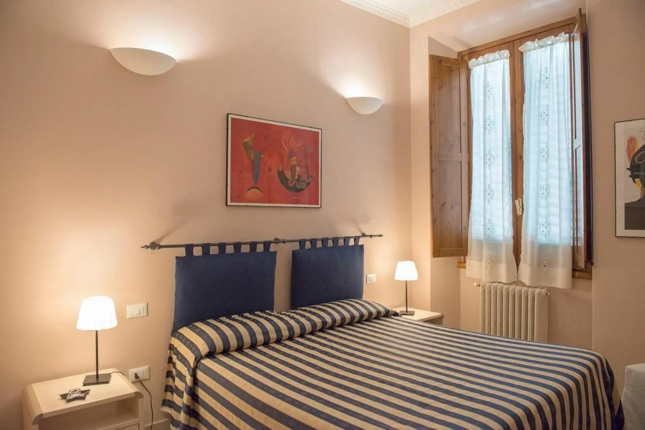 Bed in Affittacamere Benedetta