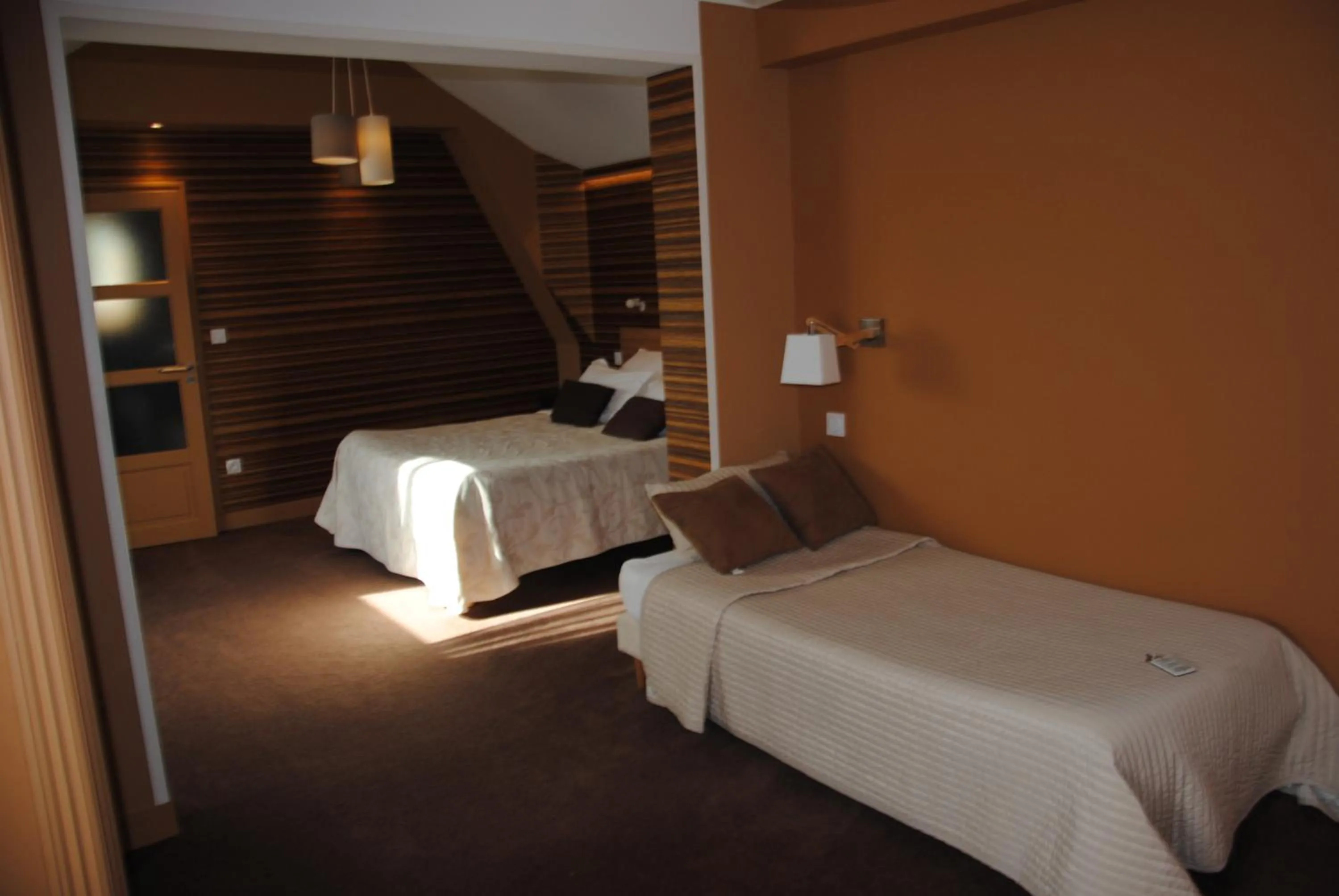 Photo of the whole room, Bed in Logis Hotel Du Casino Restaurant Le Mathelia