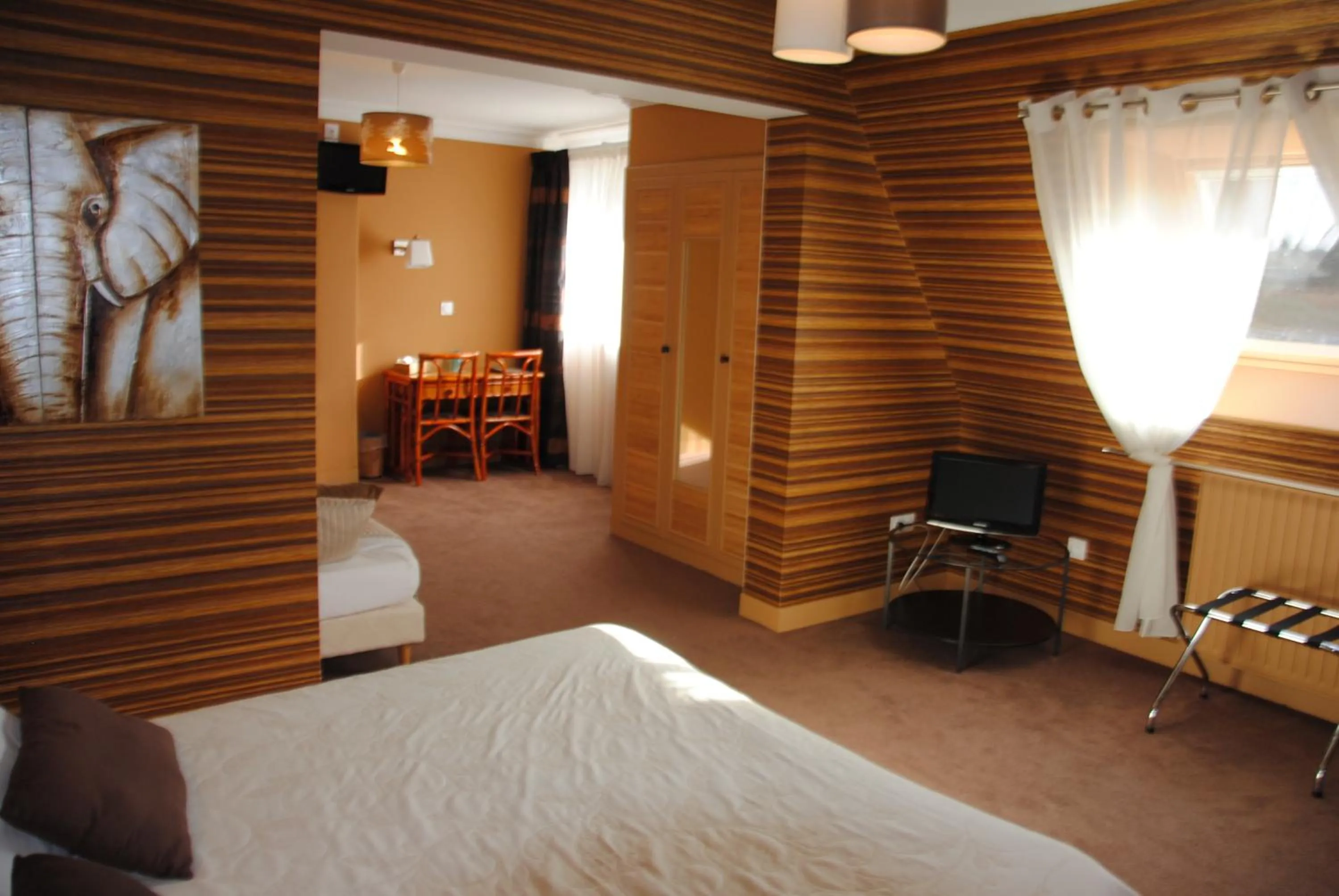 Photo of the whole room, Bed in Logis Hotel Du Casino Restaurant Le Mathelia