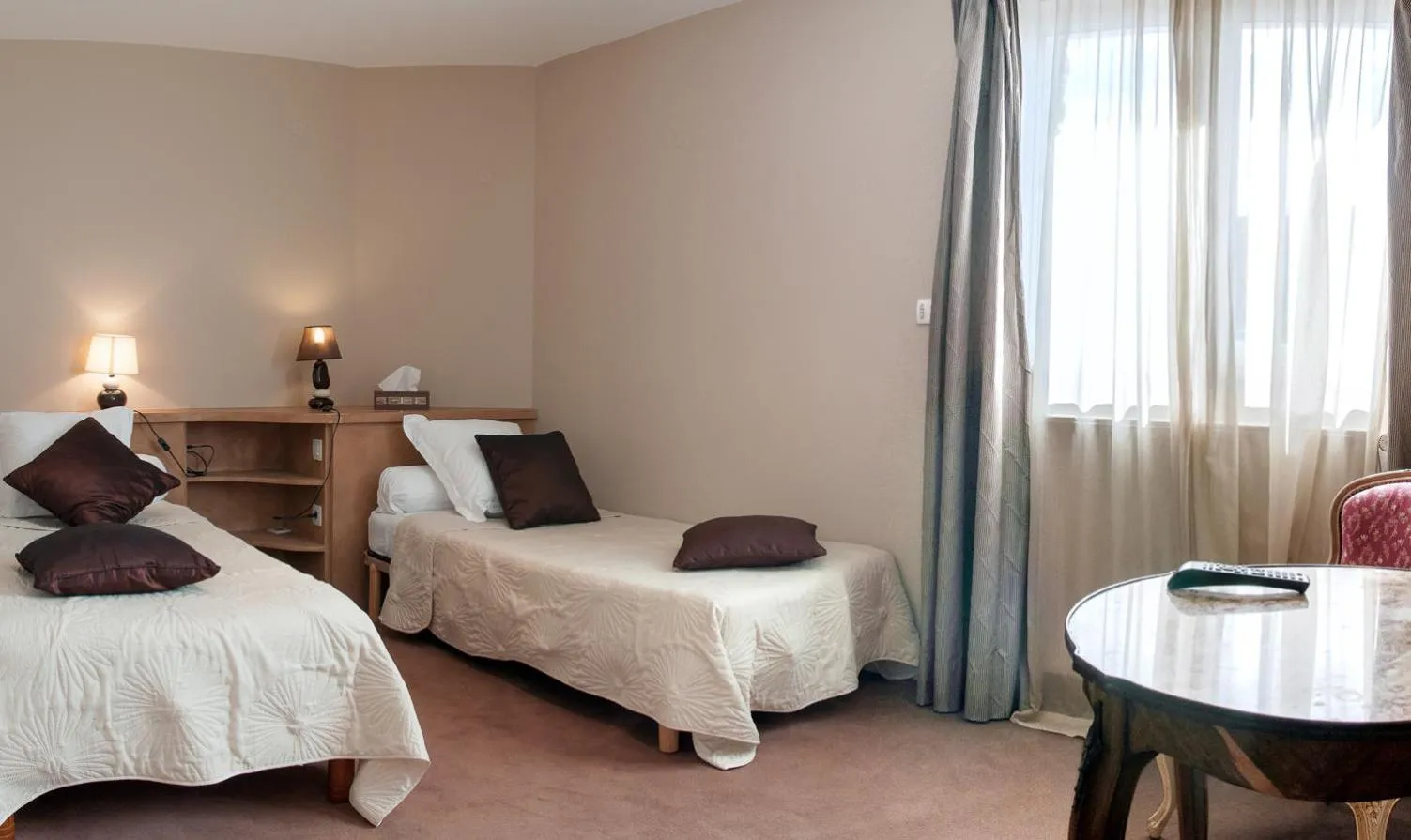 Photo of the whole room, Bed in Logis Hotel Du Casino Restaurant Le Mathelia