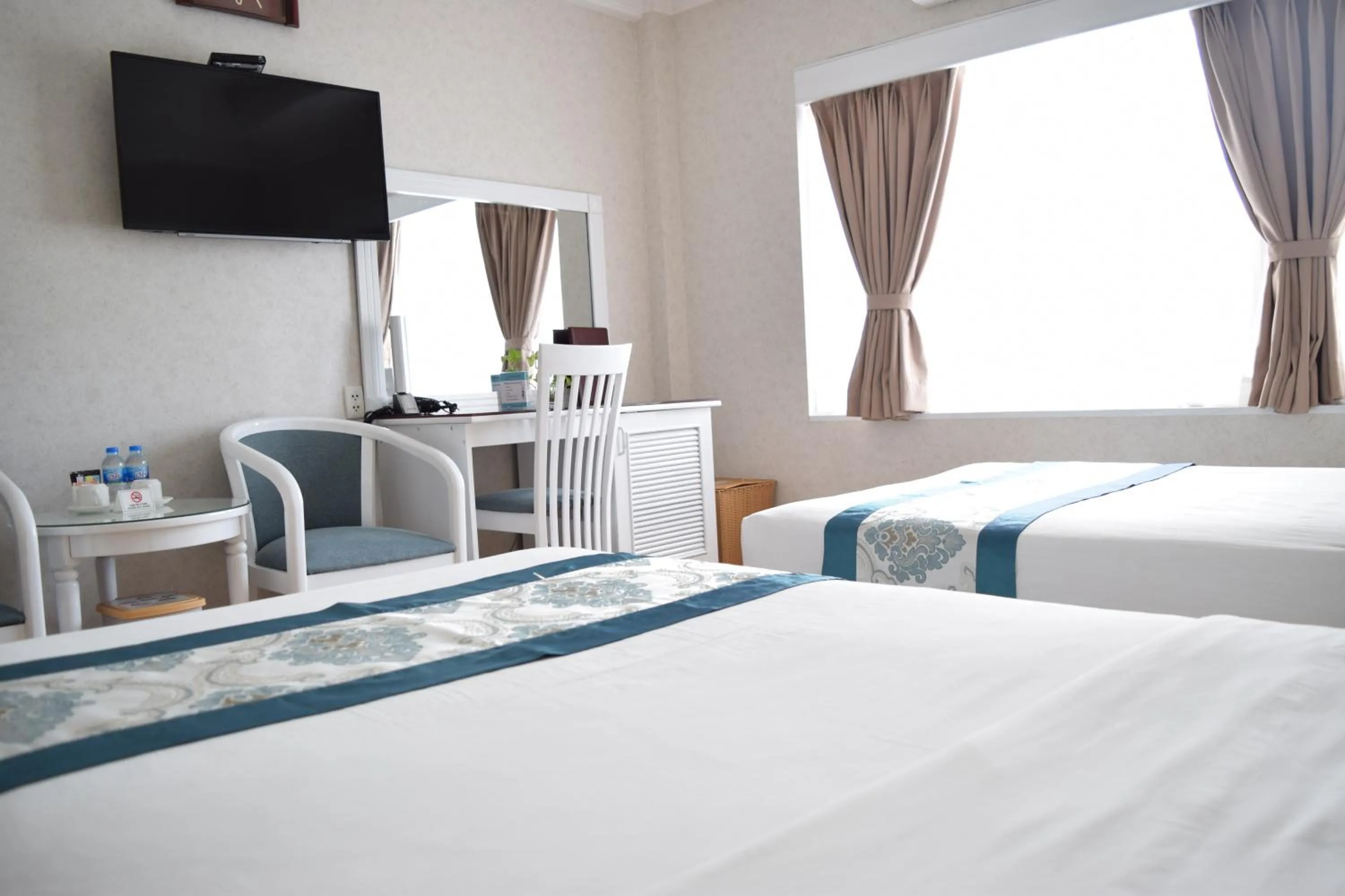 hair dresser, Bed in Rang Dong Hotel