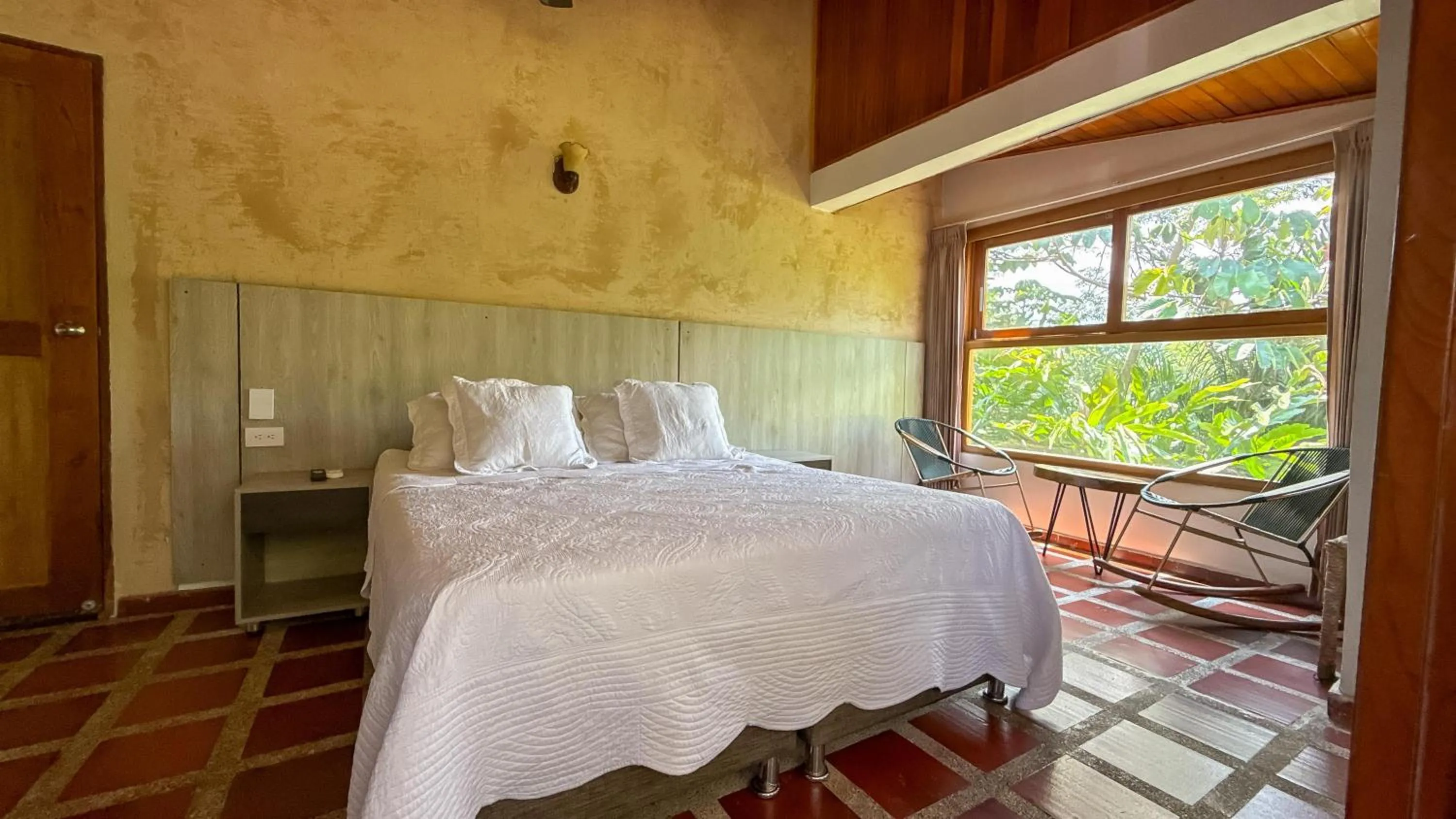Bed in Portales del Tayrona Garden Hotel