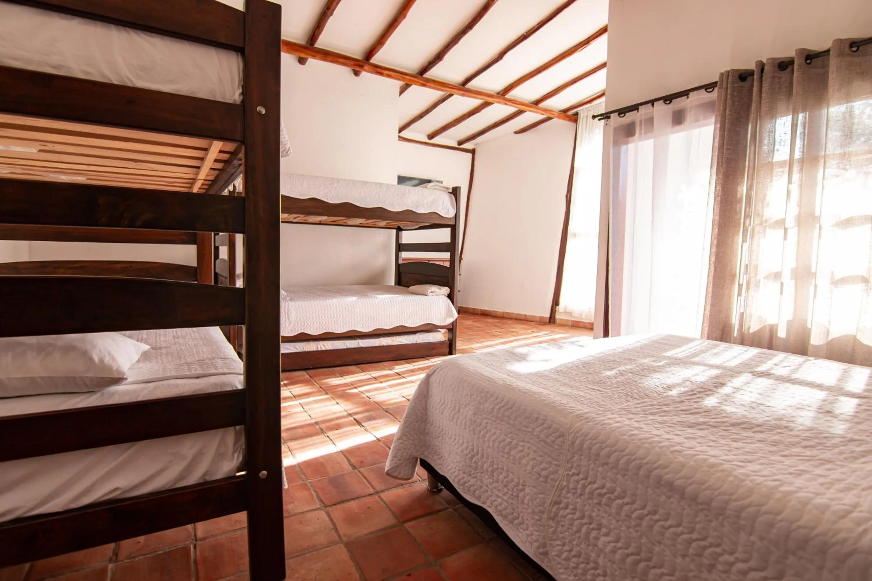 Photo of the whole room, Bed in Portales del Tayrona Garden Hotel