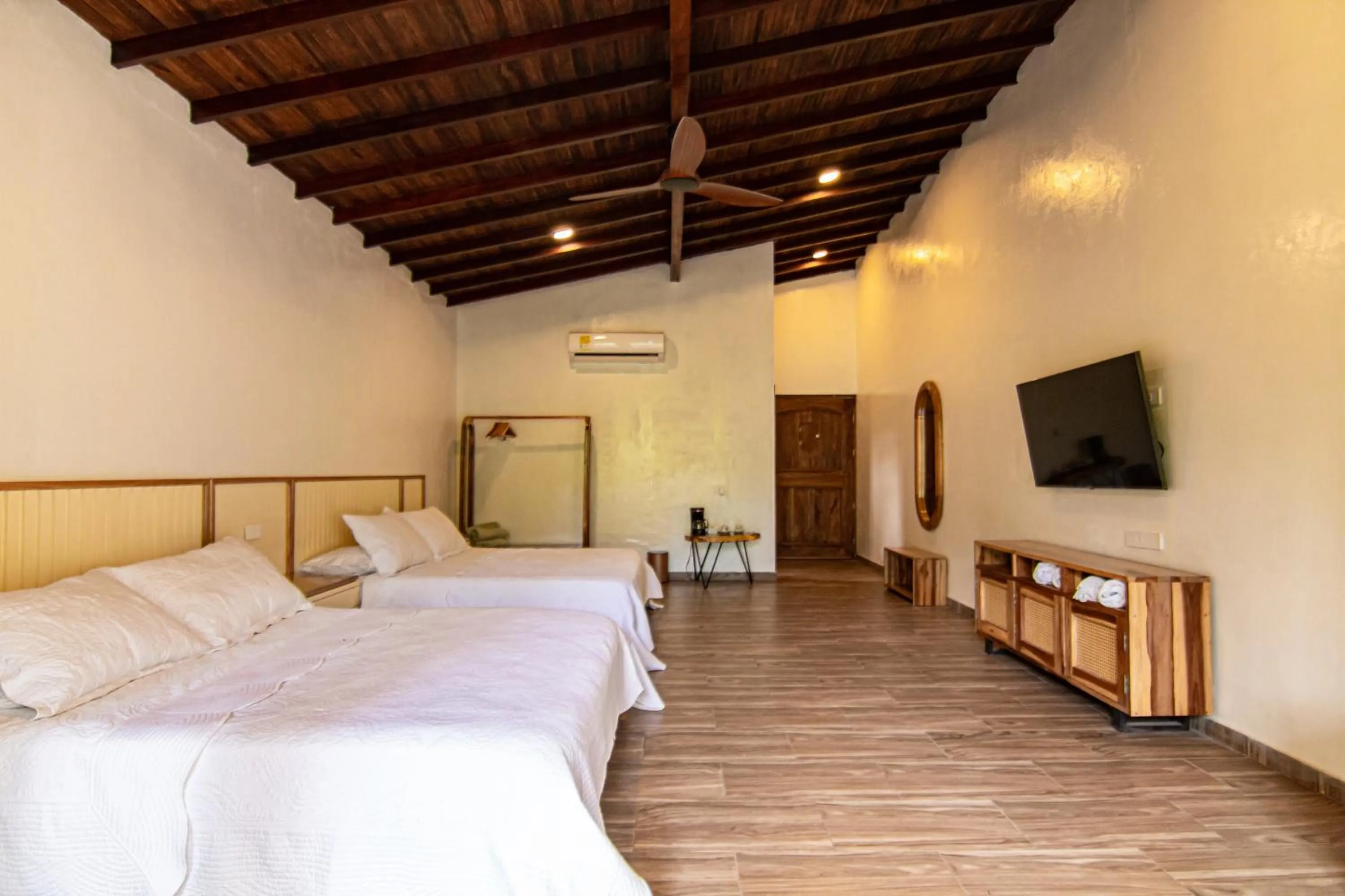 Photo of the whole room, Bed in Portales del Tayrona Garden Hotel