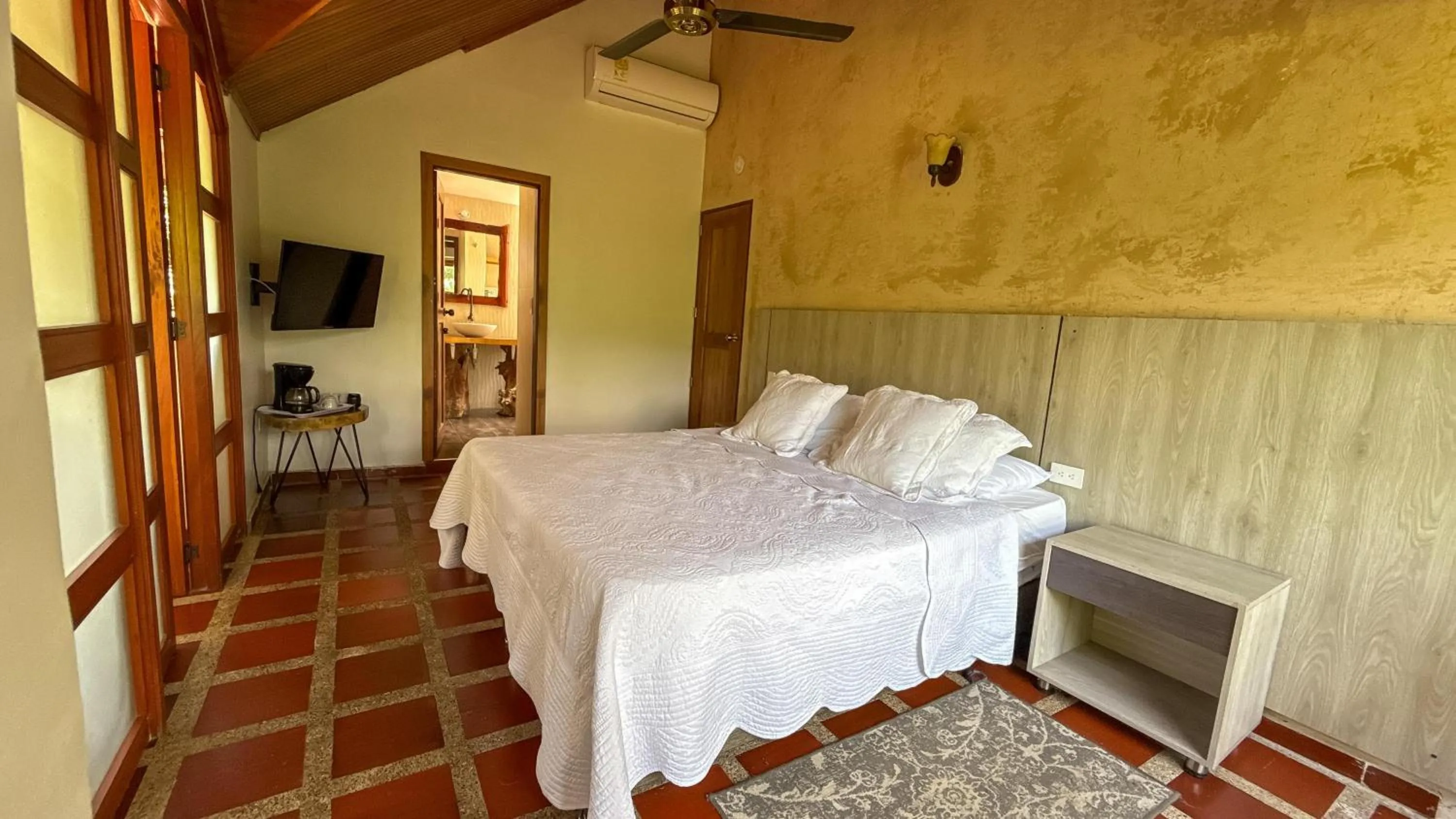 Bed in Portales del Tayrona Garden Hotel