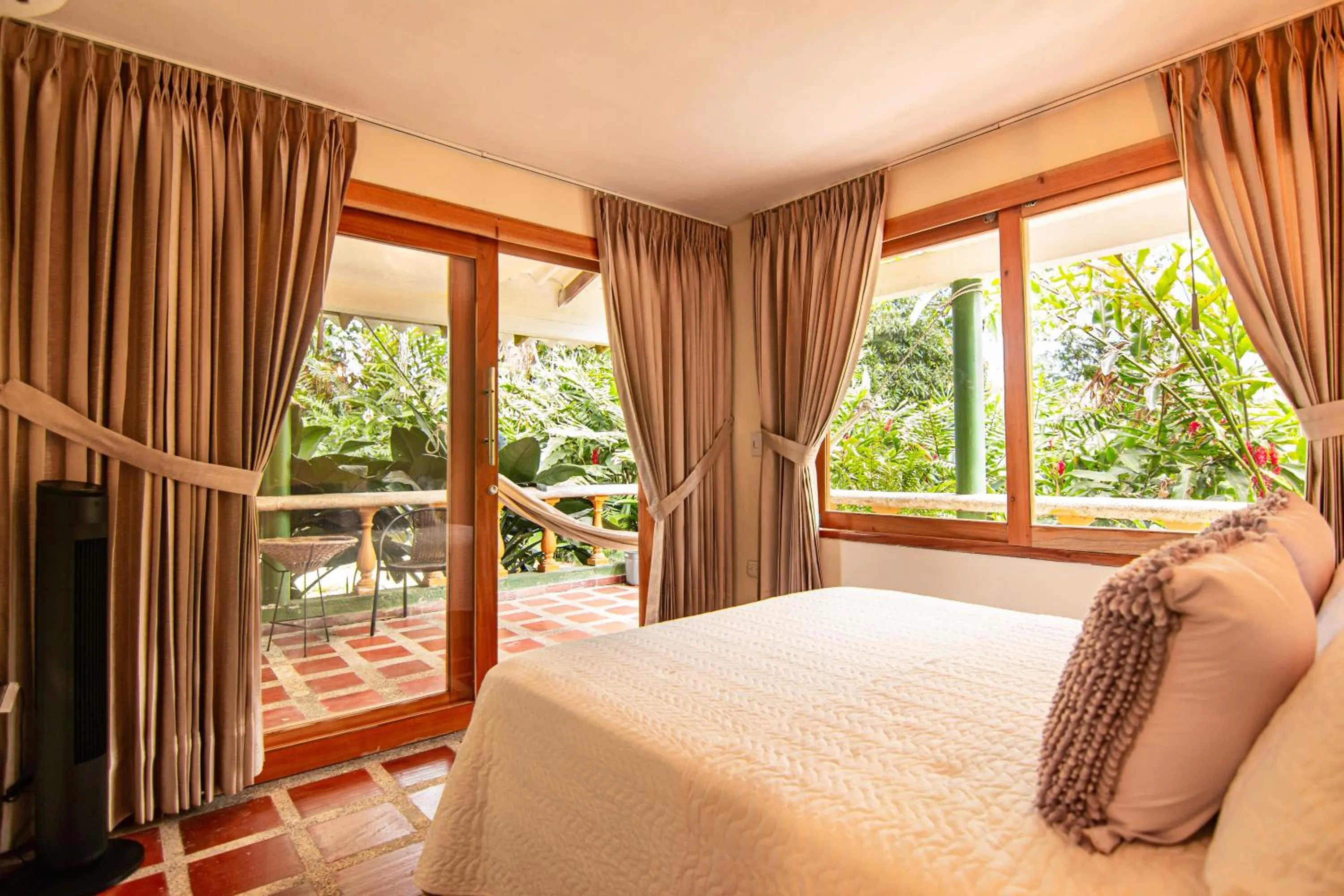 Bed in Portales del Tayrona Garden Hotel