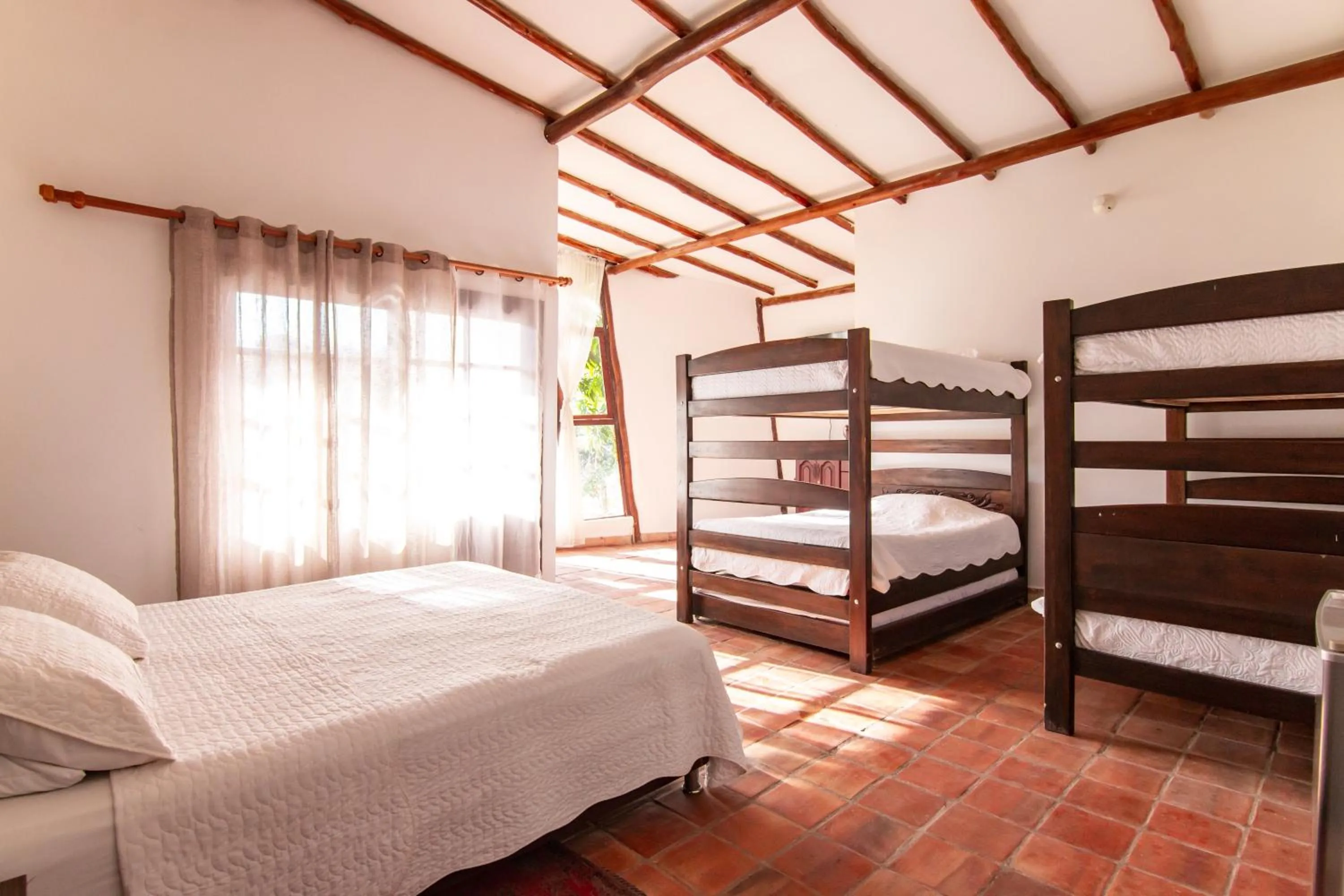 Photo of the whole room, Bed in Portales del Tayrona Garden Hotel