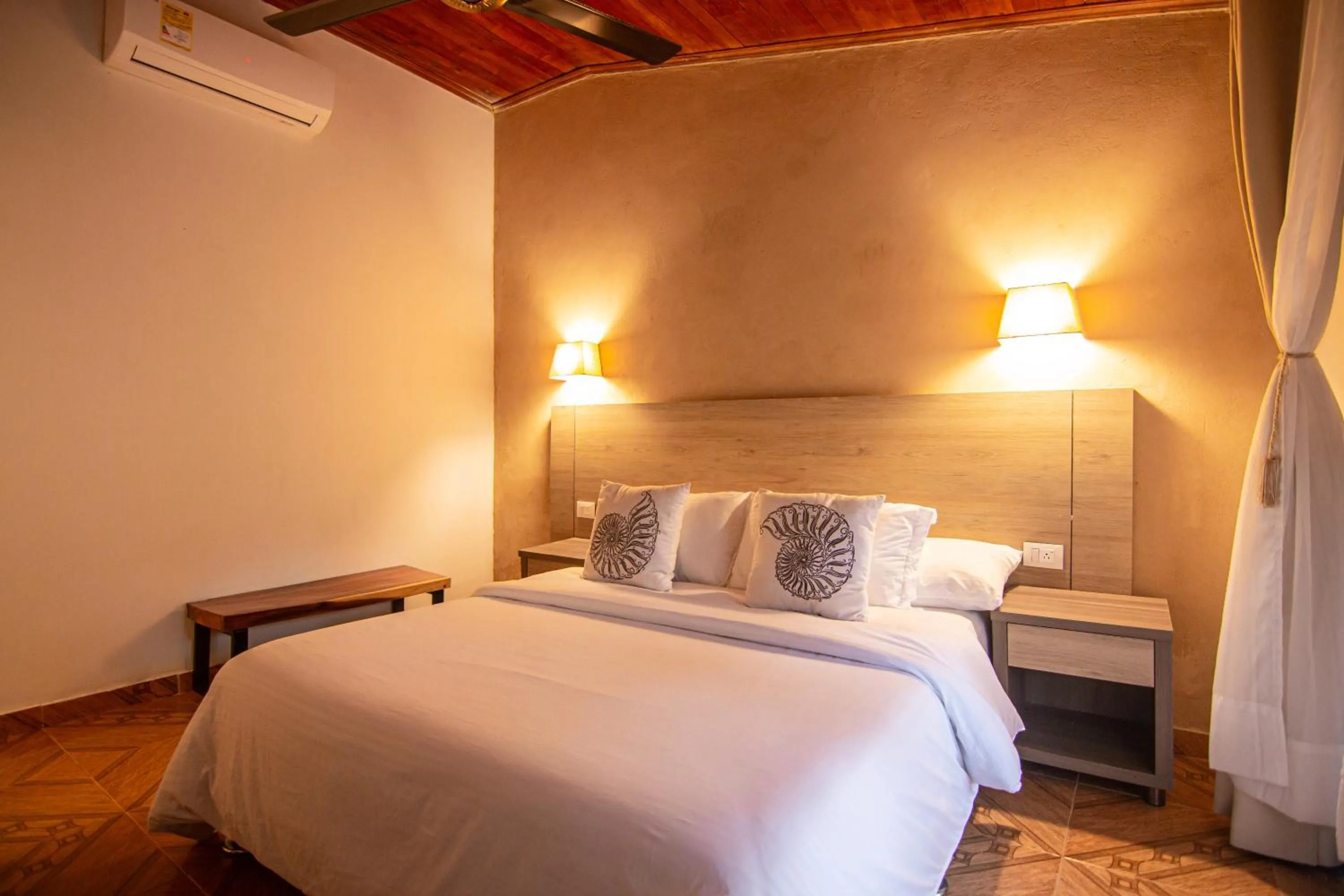 Bed in Portales del Tayrona Garden Hotel