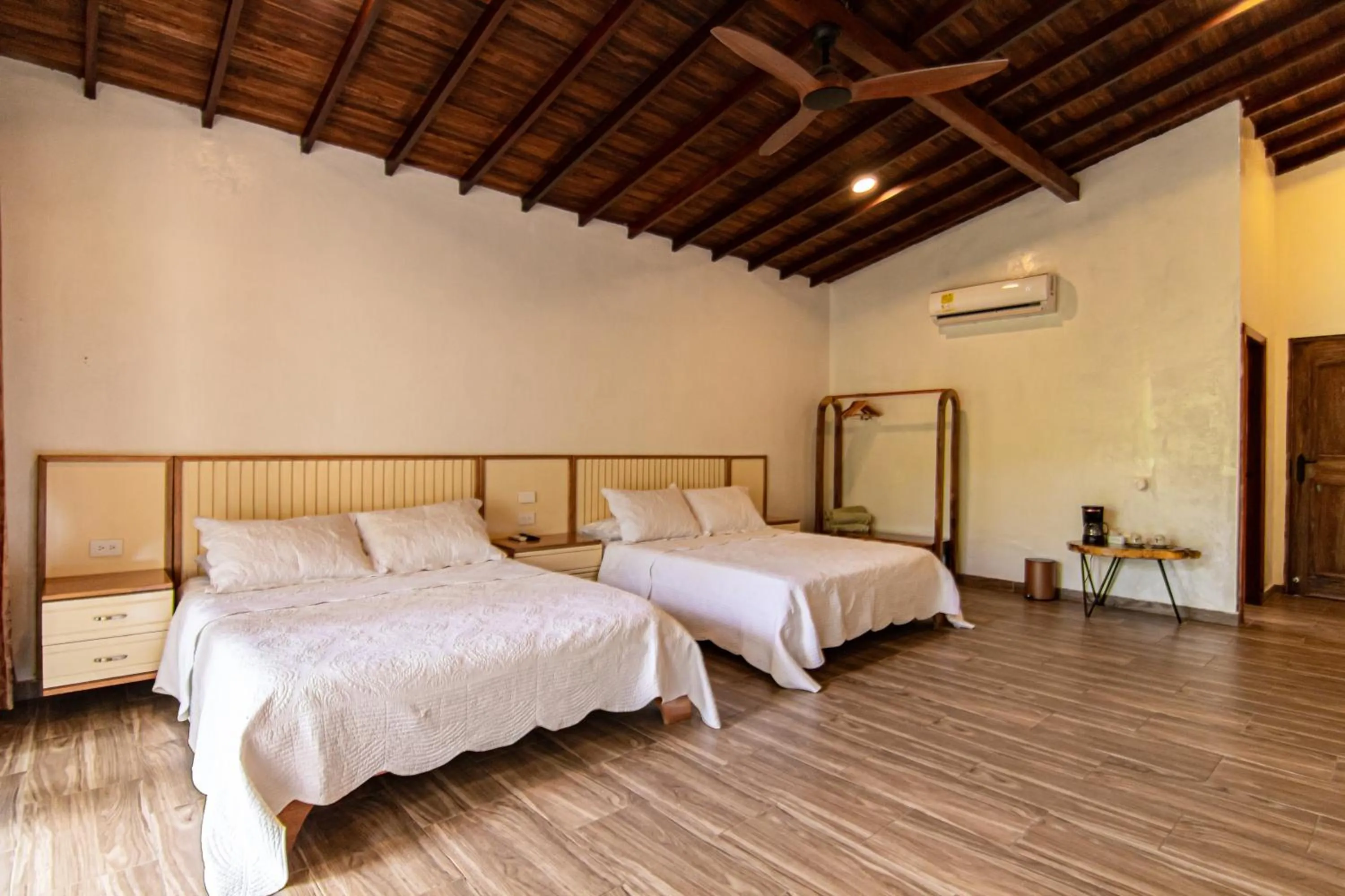 Photo of the whole room, Bed in Portales del Tayrona Garden Hotel