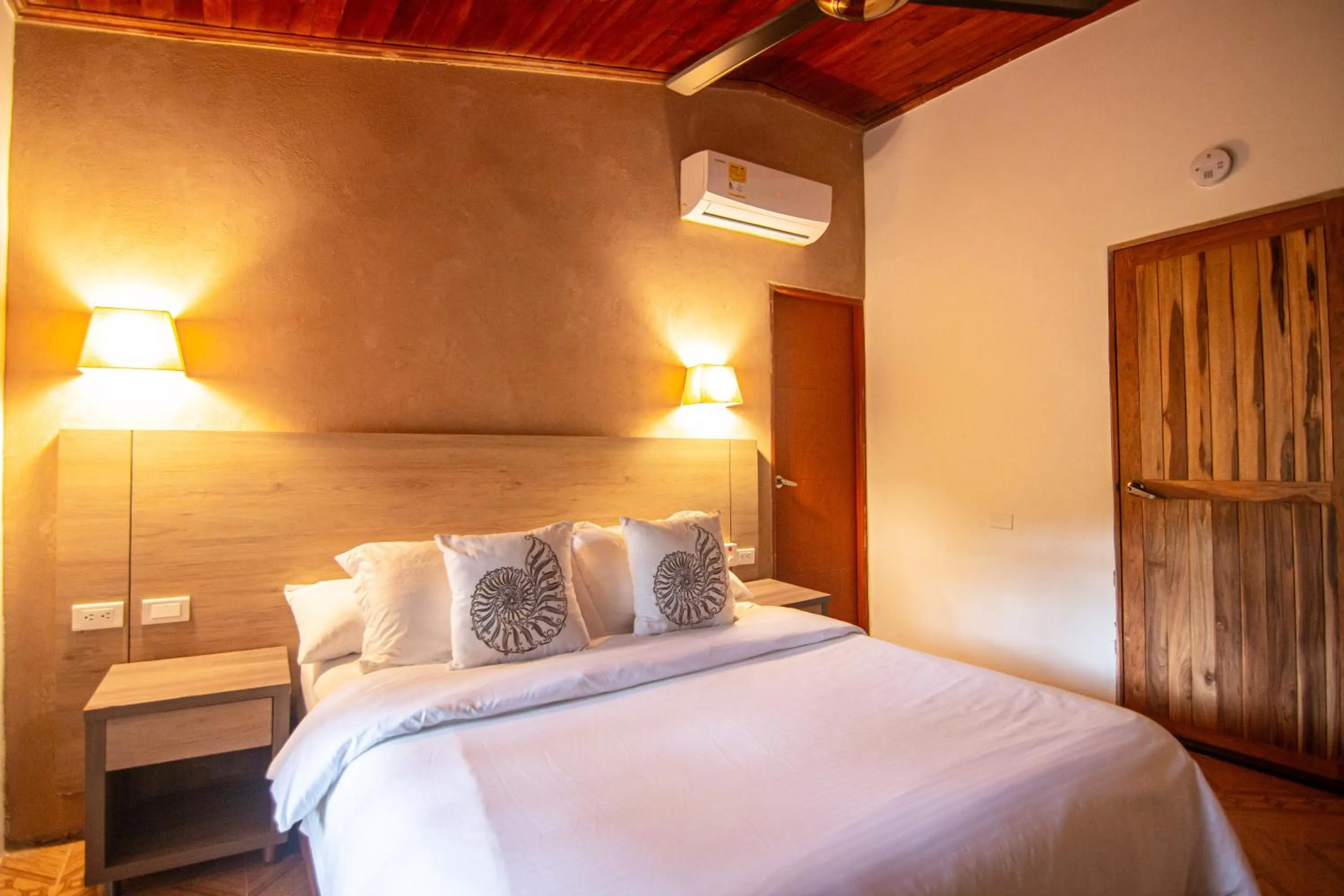 Bed in Portales del Tayrona Garden Hotel