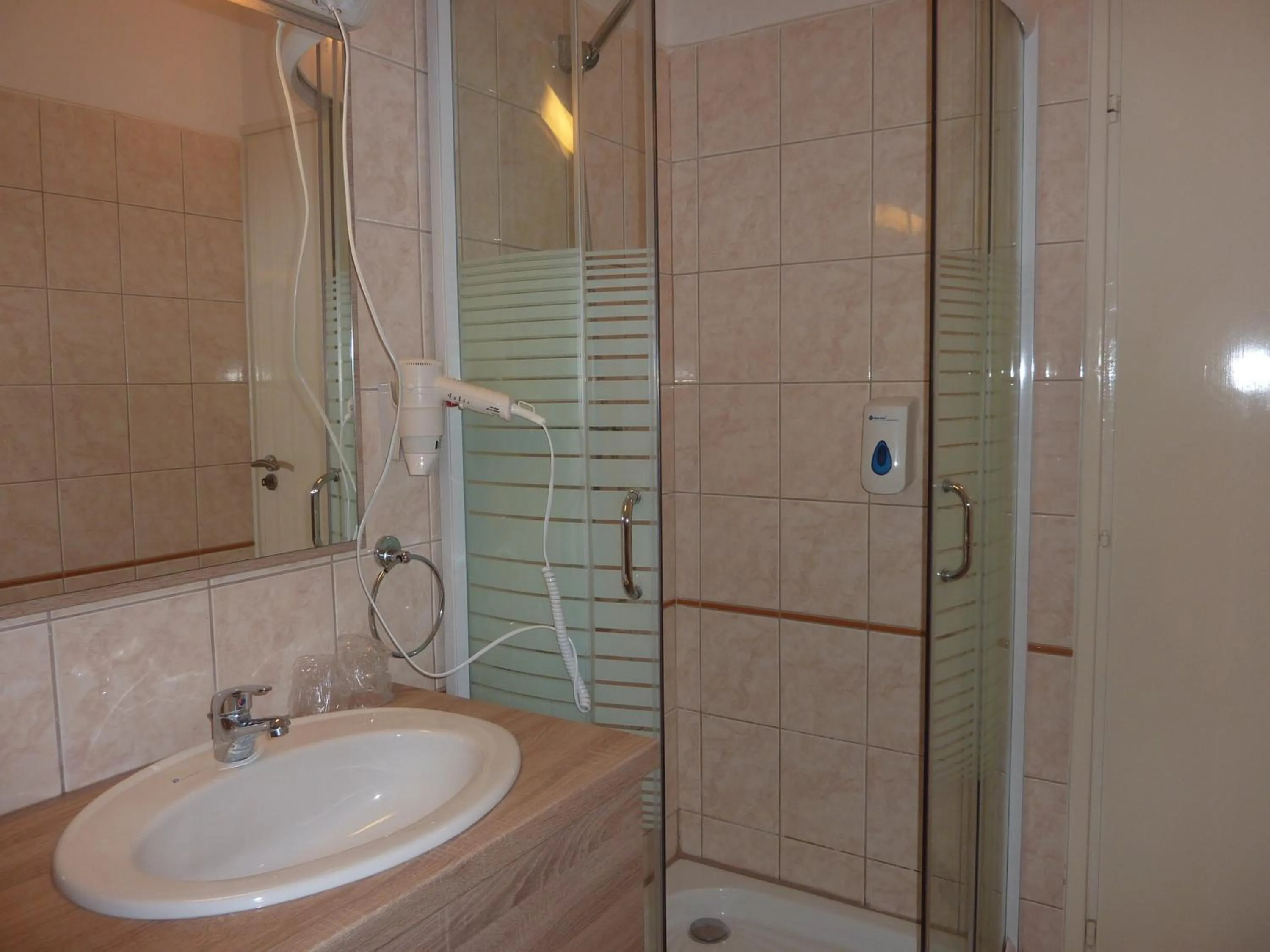 Bathroom in Zsanett Hotel