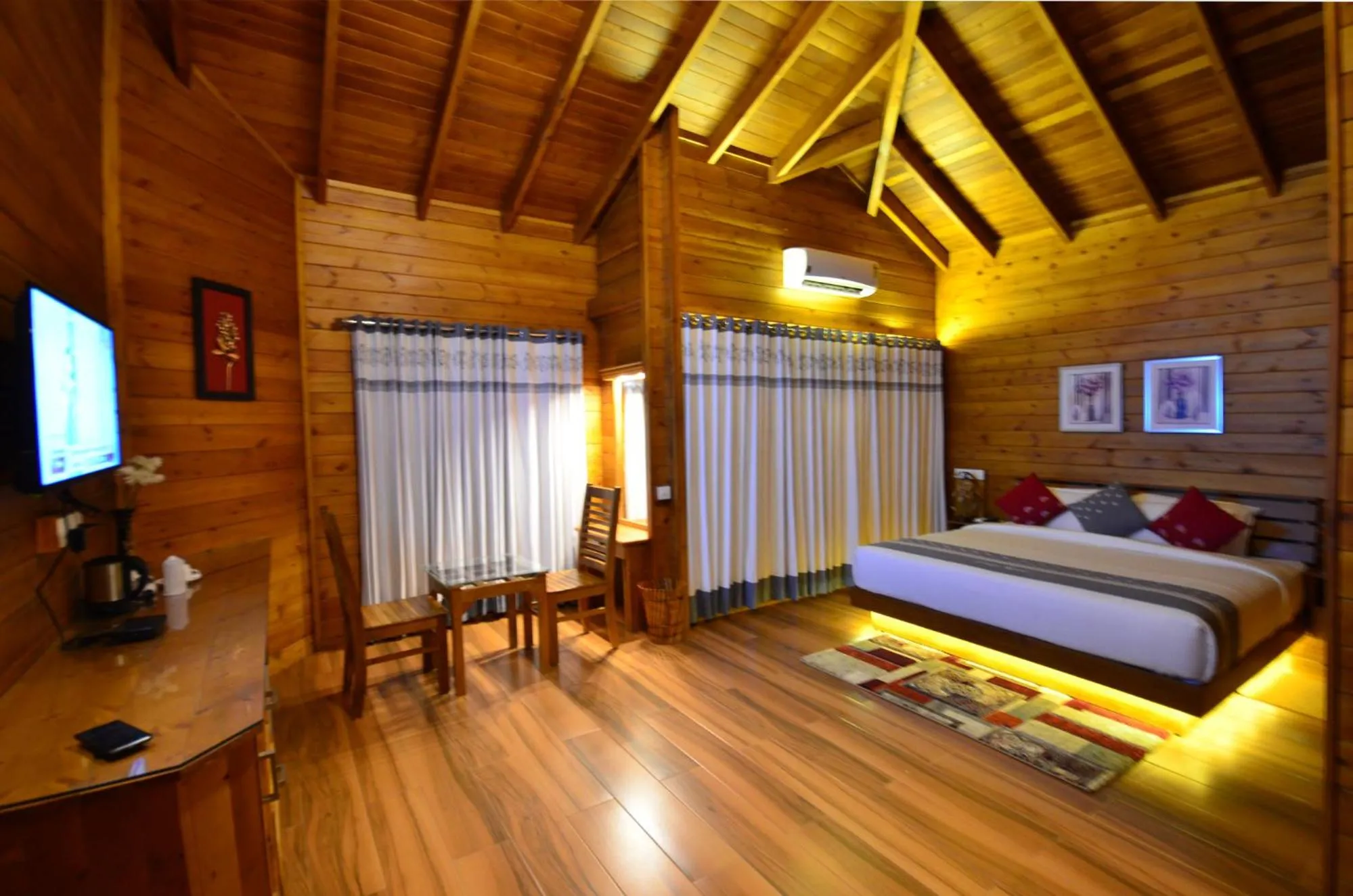 Bed in LakeRose Wayanad Resort